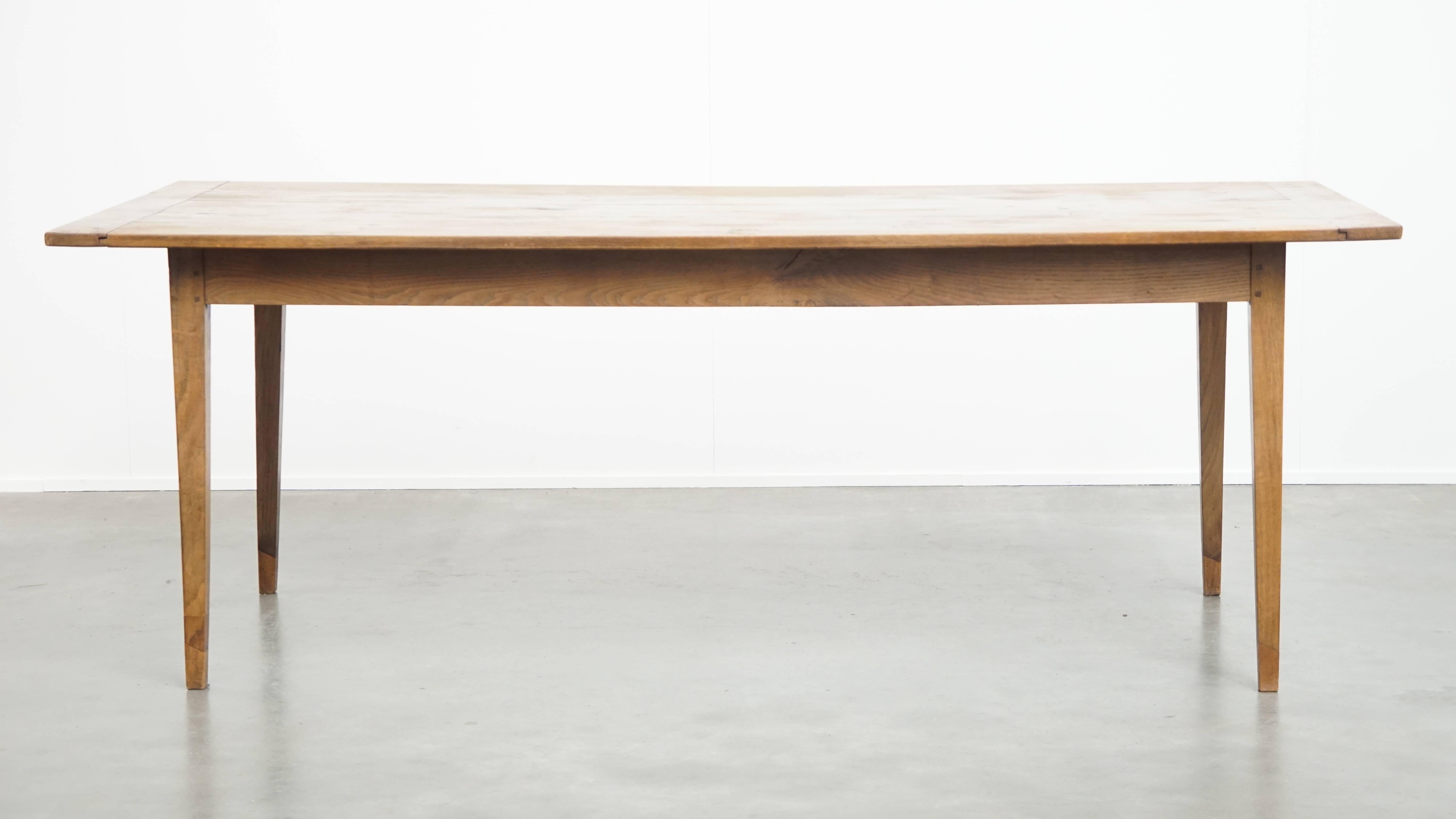 Offered here is this timeless and characterful antique French dining table, comfortably seating at least 6 people. 

A timeless addition to nearly any interior, where you can enjoy long and cozy dinners with family and friends. It pairs beautifully