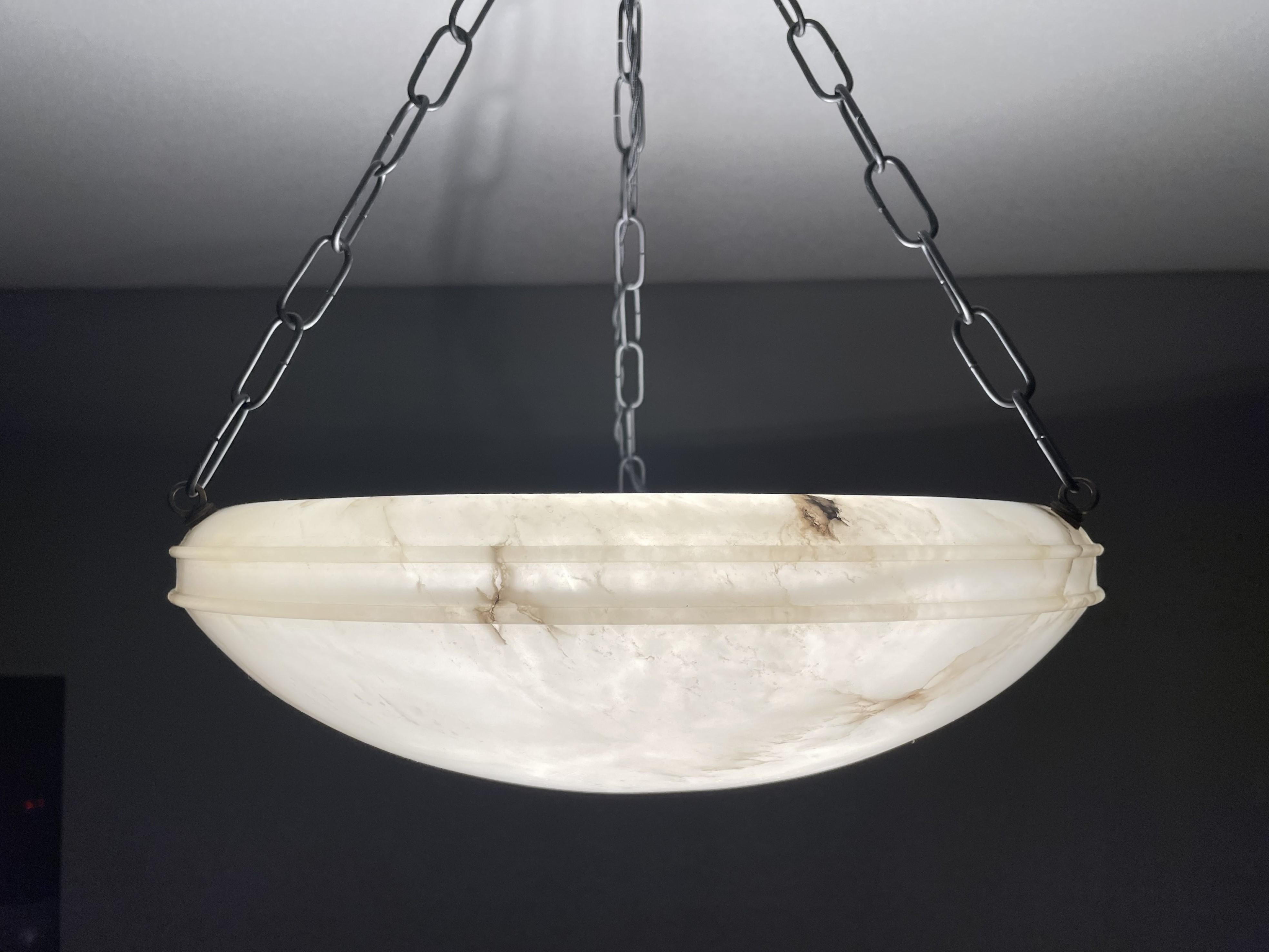 Incredibly stylish, antique, three-light alabaster pendant.

Thanks to its timeless design, its practical size and its superb condition shade this alabaster pendant is bound to light up both your days and evenings, both in summer and winter time.