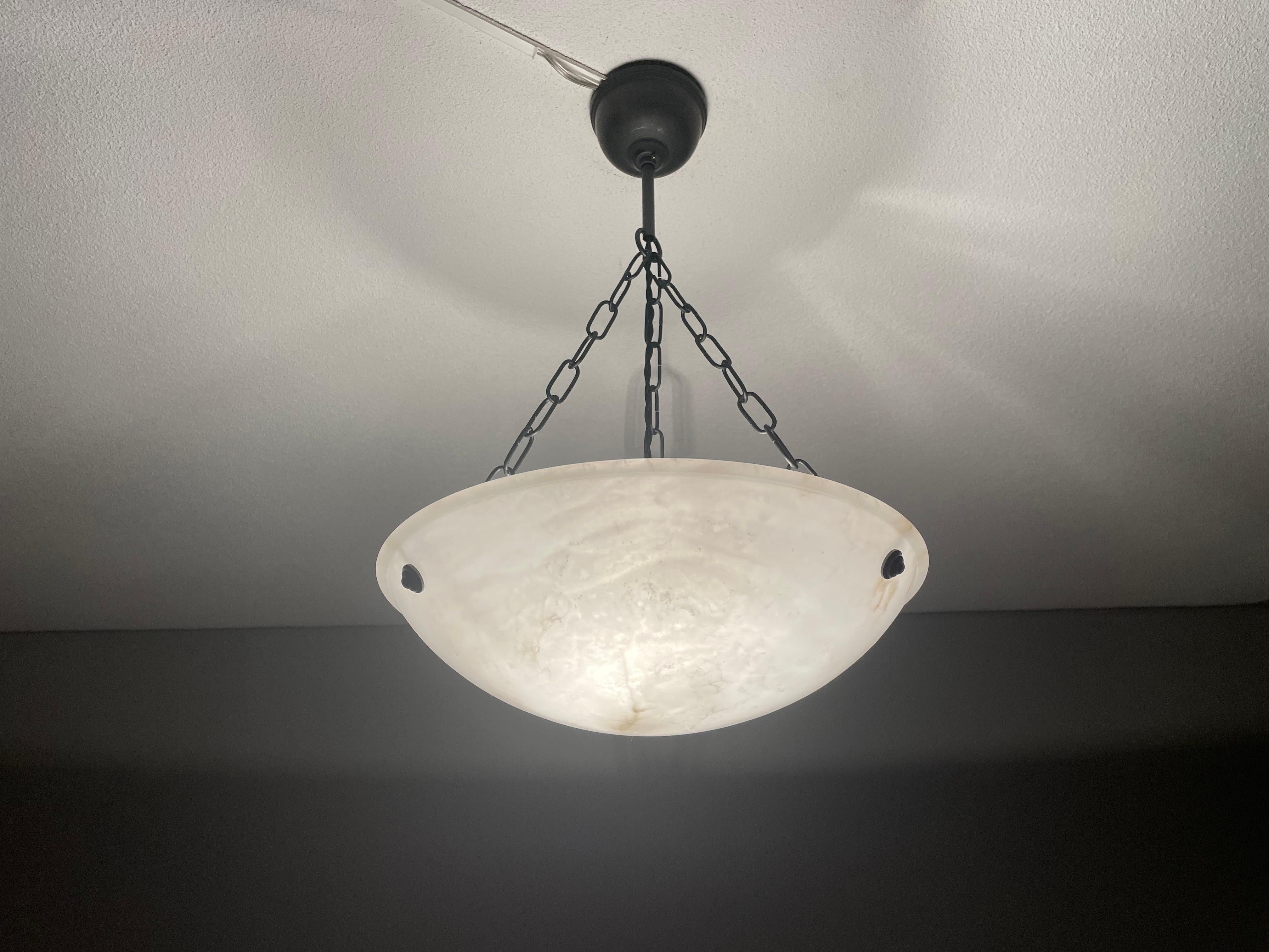 Lovely antique light fixture for an entry hall, bedroom or any other small room.

With early 20th century light fixtures being one of our specialities, we always love finding timeless pendant lights and flush mounts. This particular work of beauty