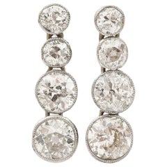 Timeless Art Deco Platinum 3 Carat Diamond Drop Earrings, circa 1930