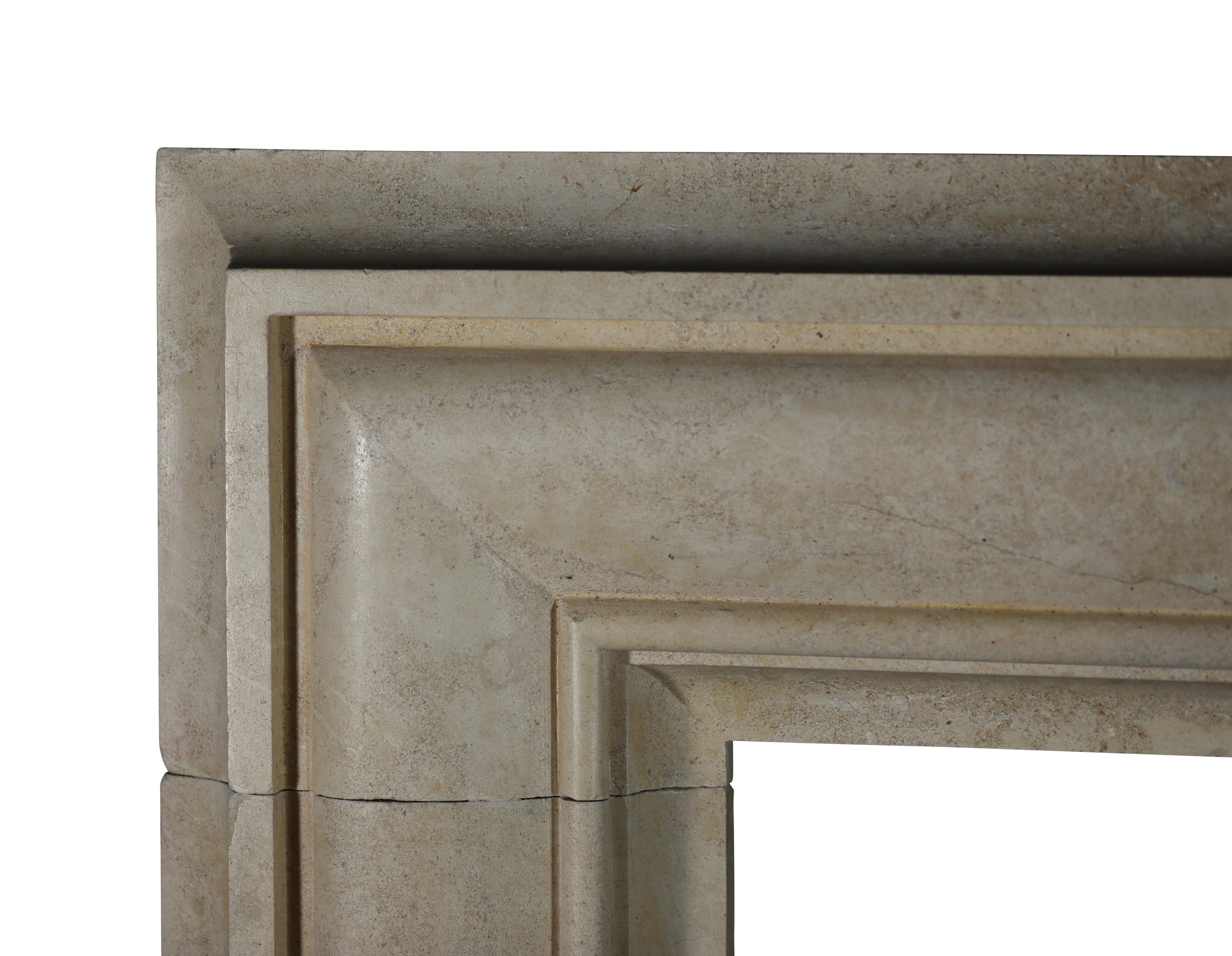 French Timeless Bolection Stone Fireplace Surround For Sale