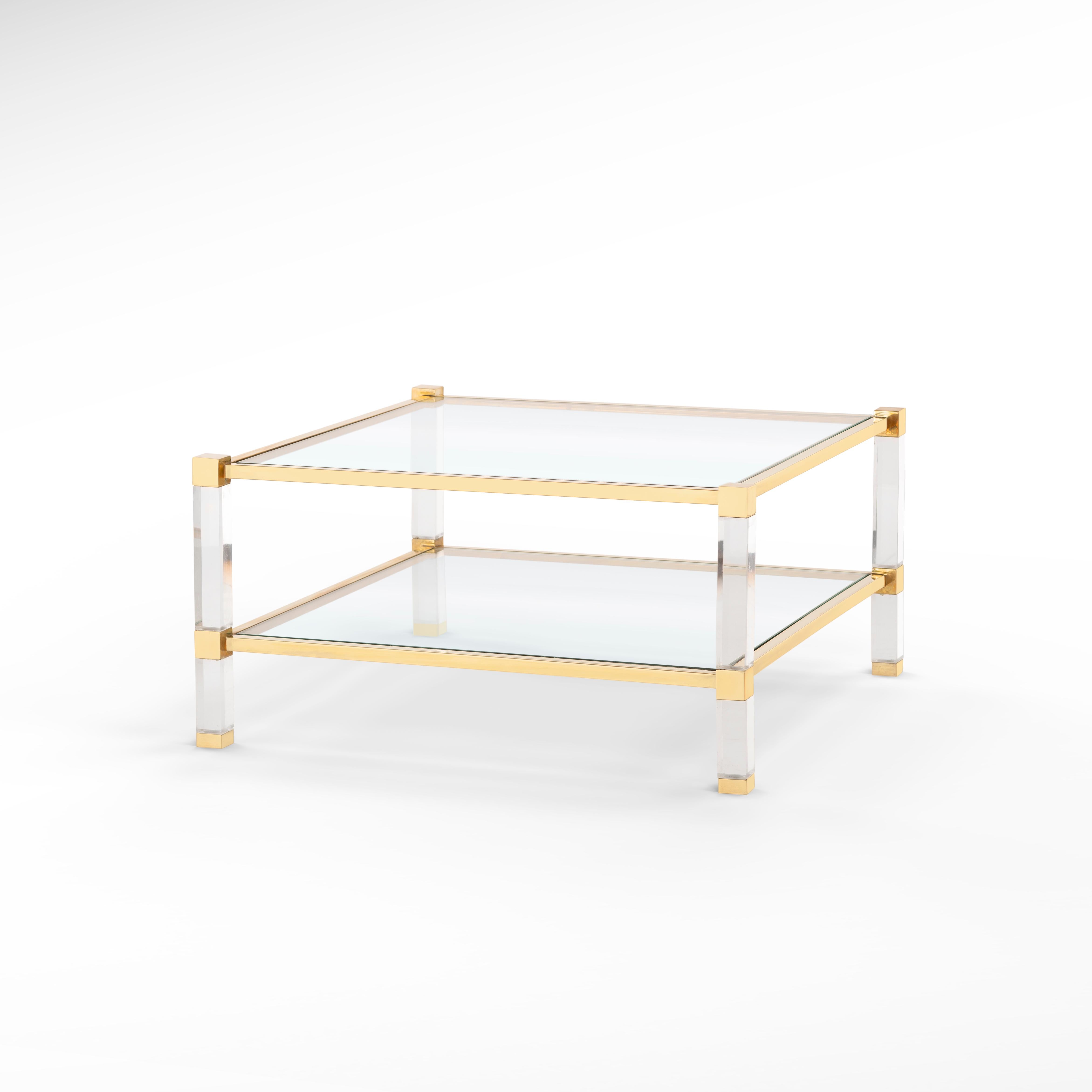 Timeless brass & plexiglass/ acrylic side table with glass top & shelf.
Translucent as Moonlight, this plexiglass and brass coffee table will make your space shimmer with elegance. It’s the perfect piece for your home to host guests with a touch of