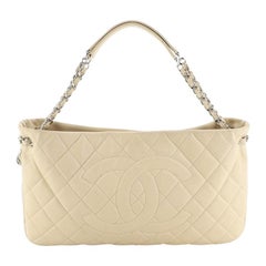 Timeless CC Expandable Tote Quilted Caviar Medium