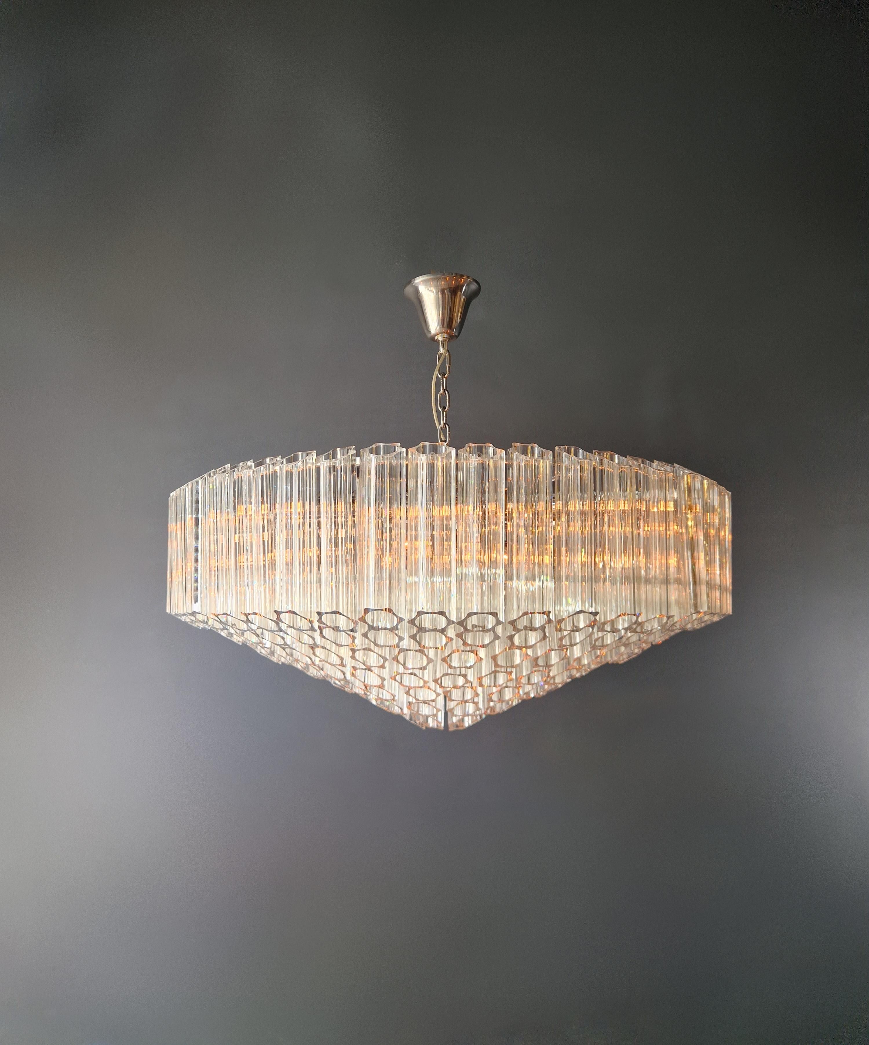 Introducing a brand new modern ceiling chandelier that captures new age elegance and fits perfectly in smaller and larger spaces. This exquisite piece has been crafted with precision from crystals and is a testament to our in-house manufacturing