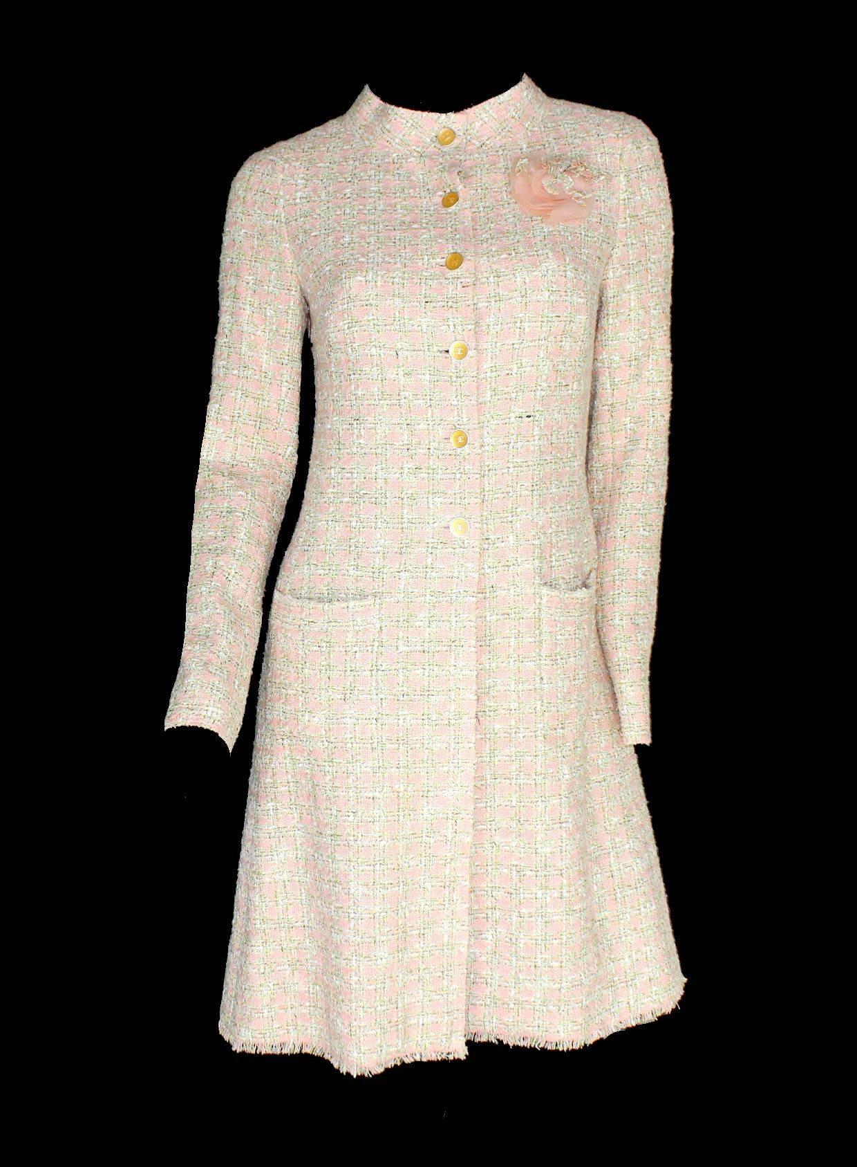 
        Beautiful CHANEL tweed coat 
        A true CHANEL signature item that will last you for many years
        Stunning pastel colors - perfect for spring
        Two front pockets
Beautiful detachable silk & tweed camellia brooch
       