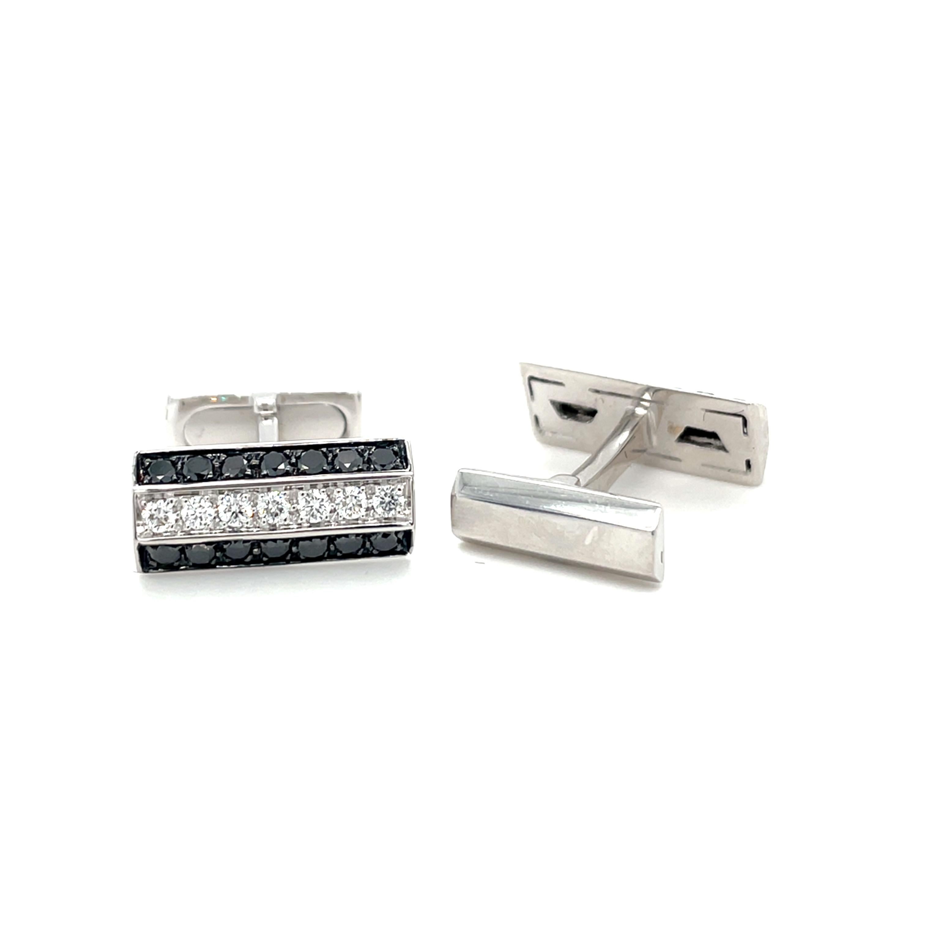 These white gold cufflinks are from Men's Collection. These cufflinks are decorated withblack diamonds Diamonds 1.06ct and diamonds G color VS clarity 0.56. The dimensions of the cufflinks are 1.8cm x 0.7cm. These cufflinks are a perfect upgrade to