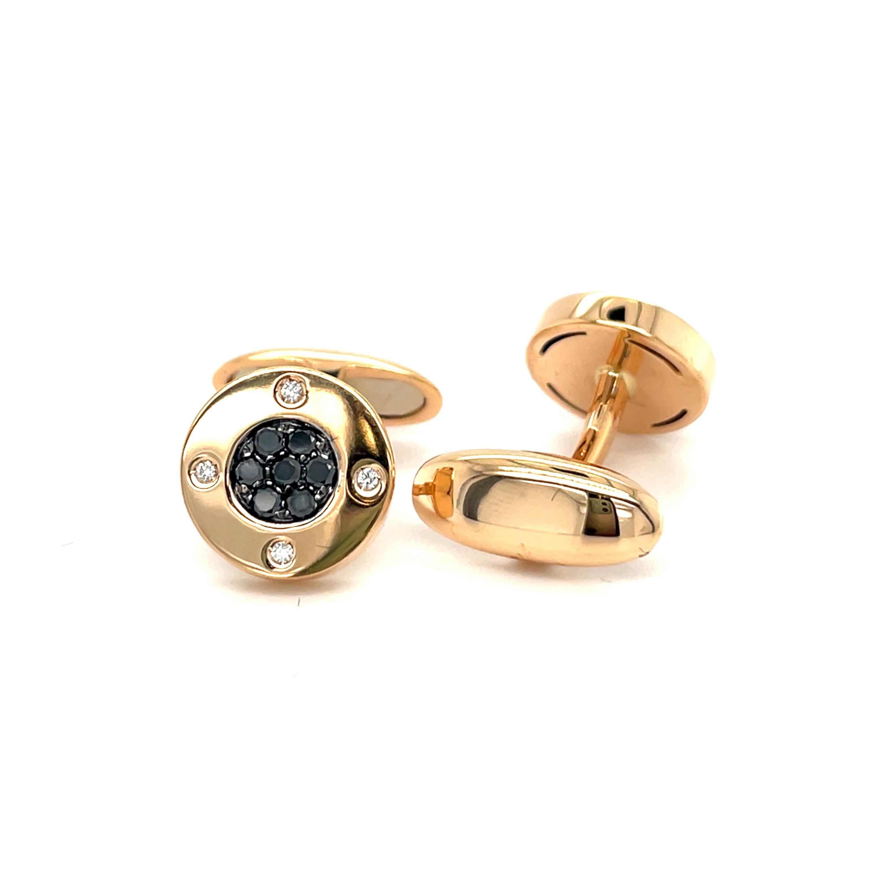 These yellow gold cufflinks are from Men's Collection. These cufflinks are decorated with black diamonds Diamonds and diamonds G color VS2 clarity 0.31. The dimensions of the cufflinks are 1.2cm. These cufflinks are a perfect upgrade to every
