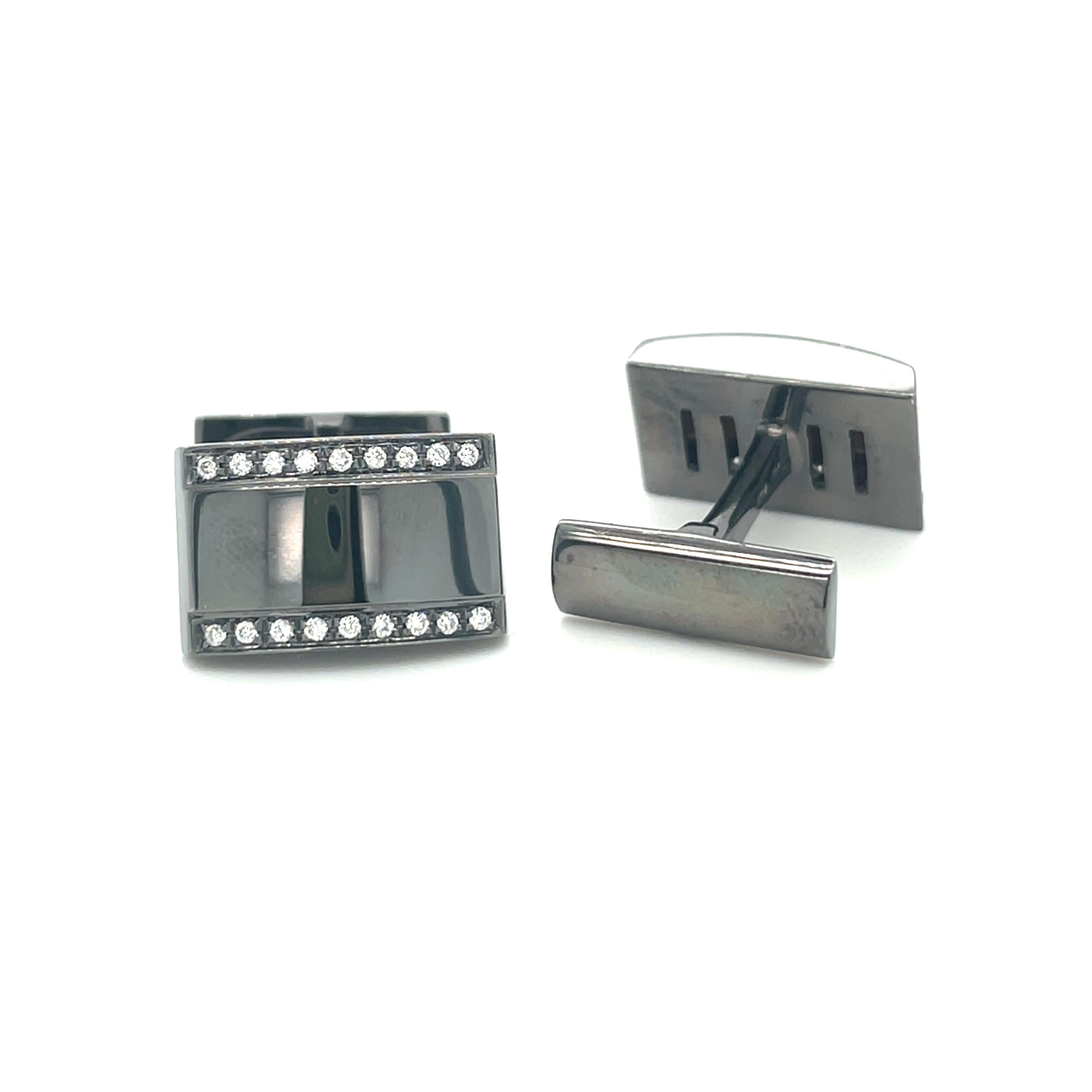 These white gold cufflinks are from Men's Collection. These cufflinks are decorated with white gold (black rhodium) and diamonds G color VS clarity 0.26 ct. The dimensions of the cufflinks are 1.5cm x 1cm. These cufflinks are a perfect upgrade to