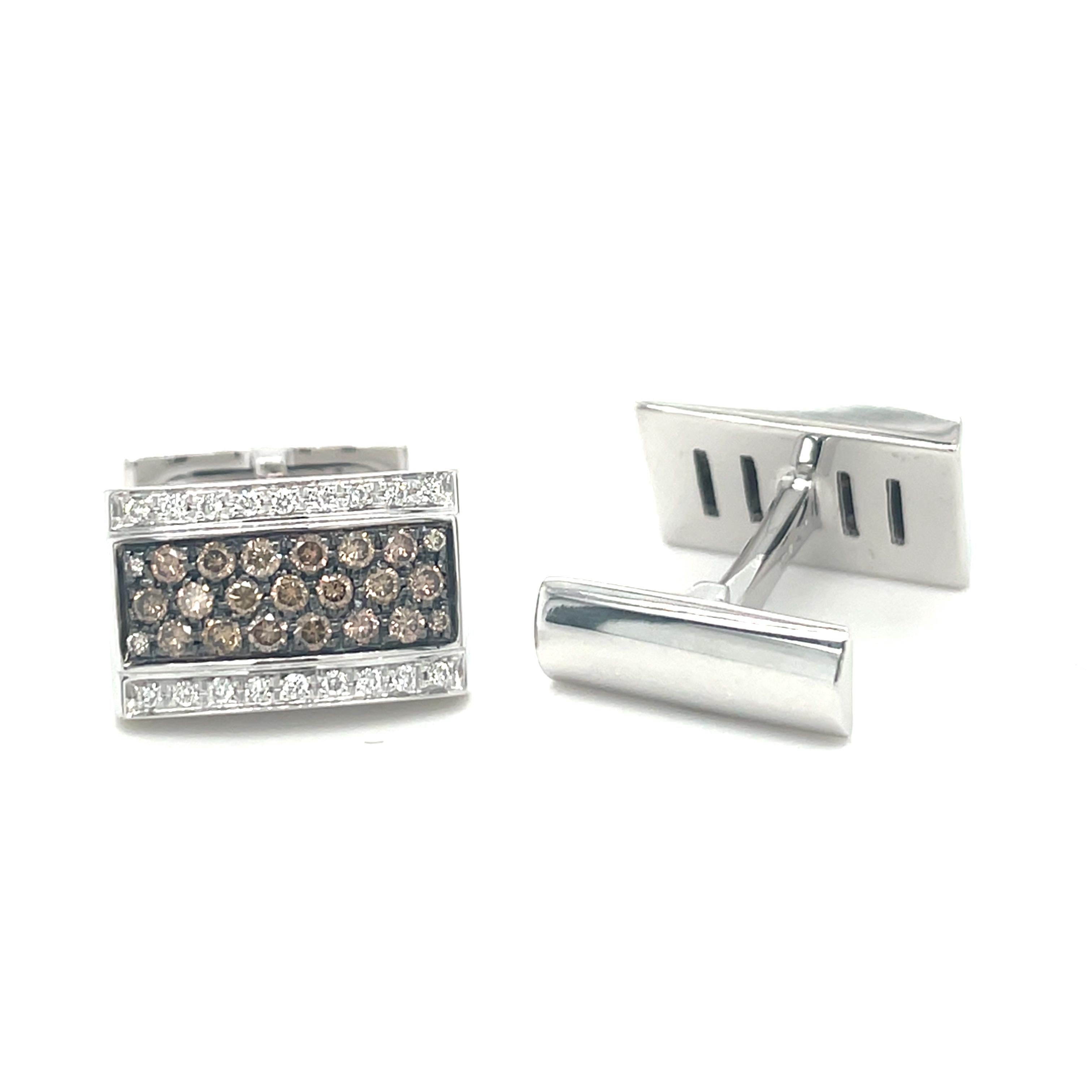 These white gold cufflinks are from Men's Collection. These cufflinks are decorated with White gold, diamond G color VS clarity 0.29 ct and brown diamonds 0.98 ct. The dimensions of the cufflinks are 1.5cm x 1cm. These cufflinks are a perfect