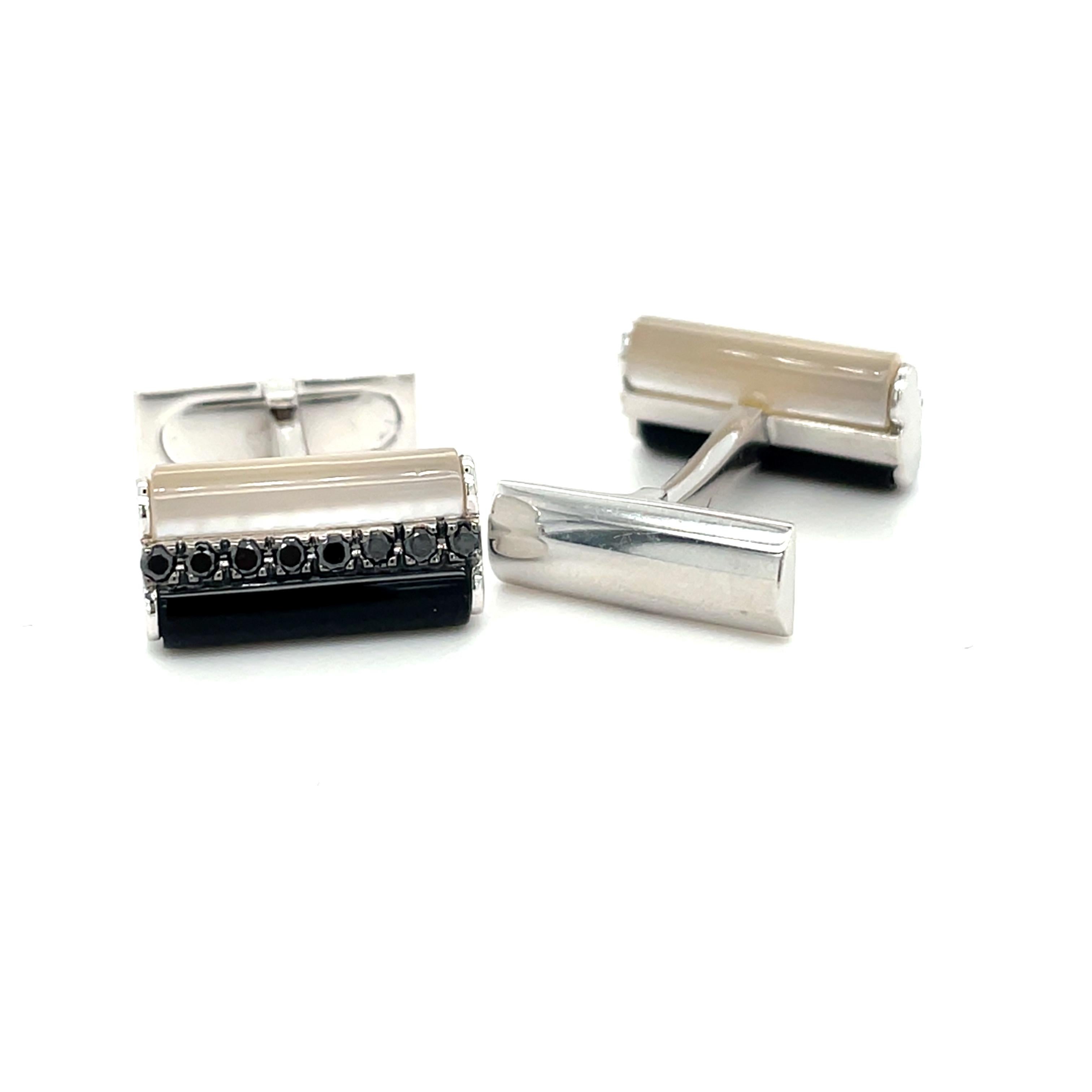 These 18K white gold  cufflinks are from timeless Collection. These very elegant cufflinks are made with white  gold, onyx in total 14 ct and black diamonds in total of 0.32 ct. Total metal weight is 6.70 gr. These cufflinks are a perfect upgrade to