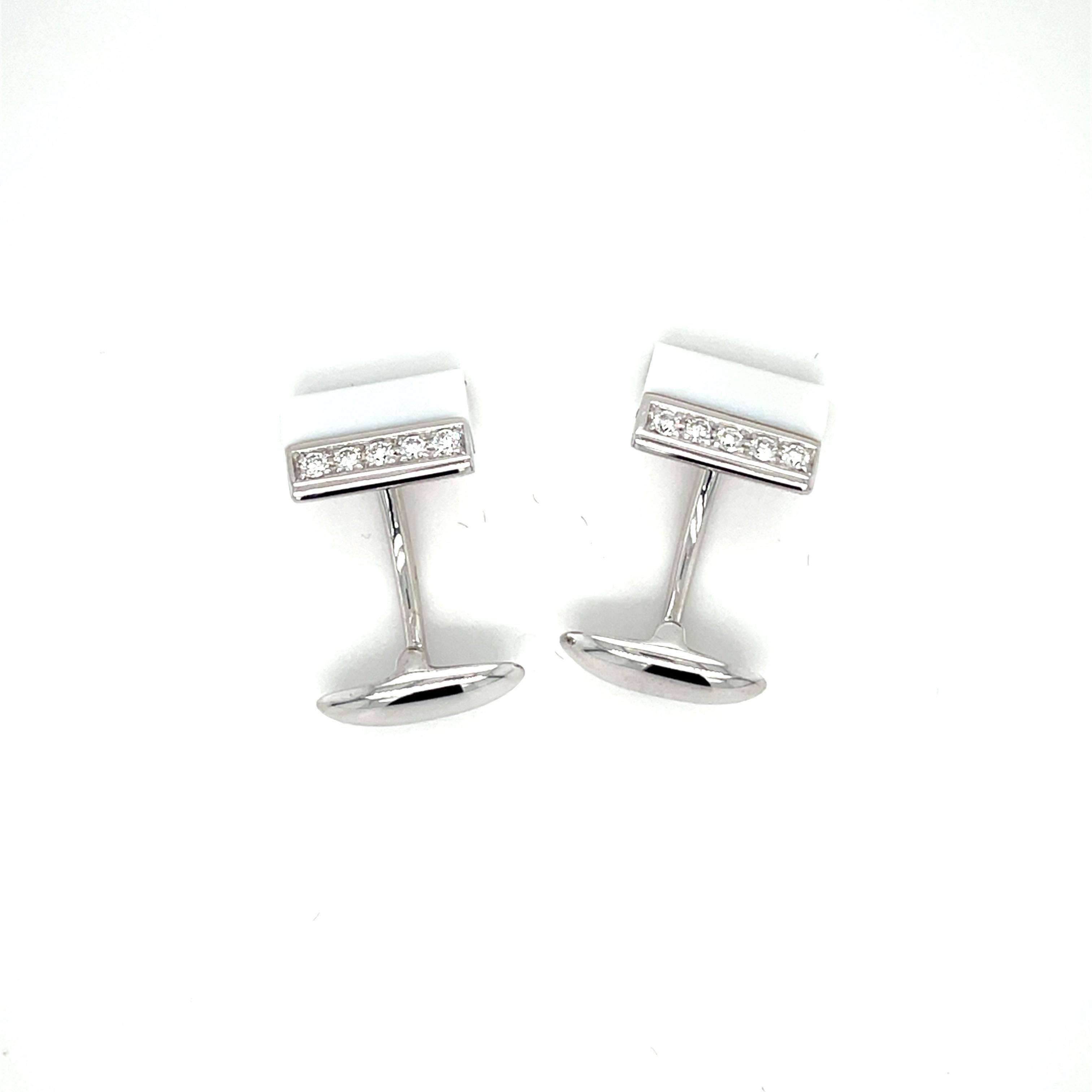 These 18K white gold unique cufflinks are from Wedding Collection. These very elegant cufflinks are made with white gold in total of 11.20gr, diamonds G color VS clarity in total of  0.27 carat and a semiprecious stone in total 9.50 ct. These