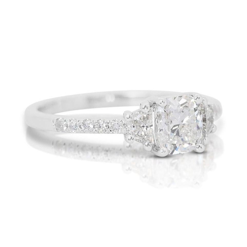 Embrace the enduring beauty of this captivating ring, featuring a mesmerizing 0.81 carat cushion cut diamond as its captivating centerpiece. Graced with an elegant H color, this diamond exudes subtle warmth and exceptional brilliance. The coveted