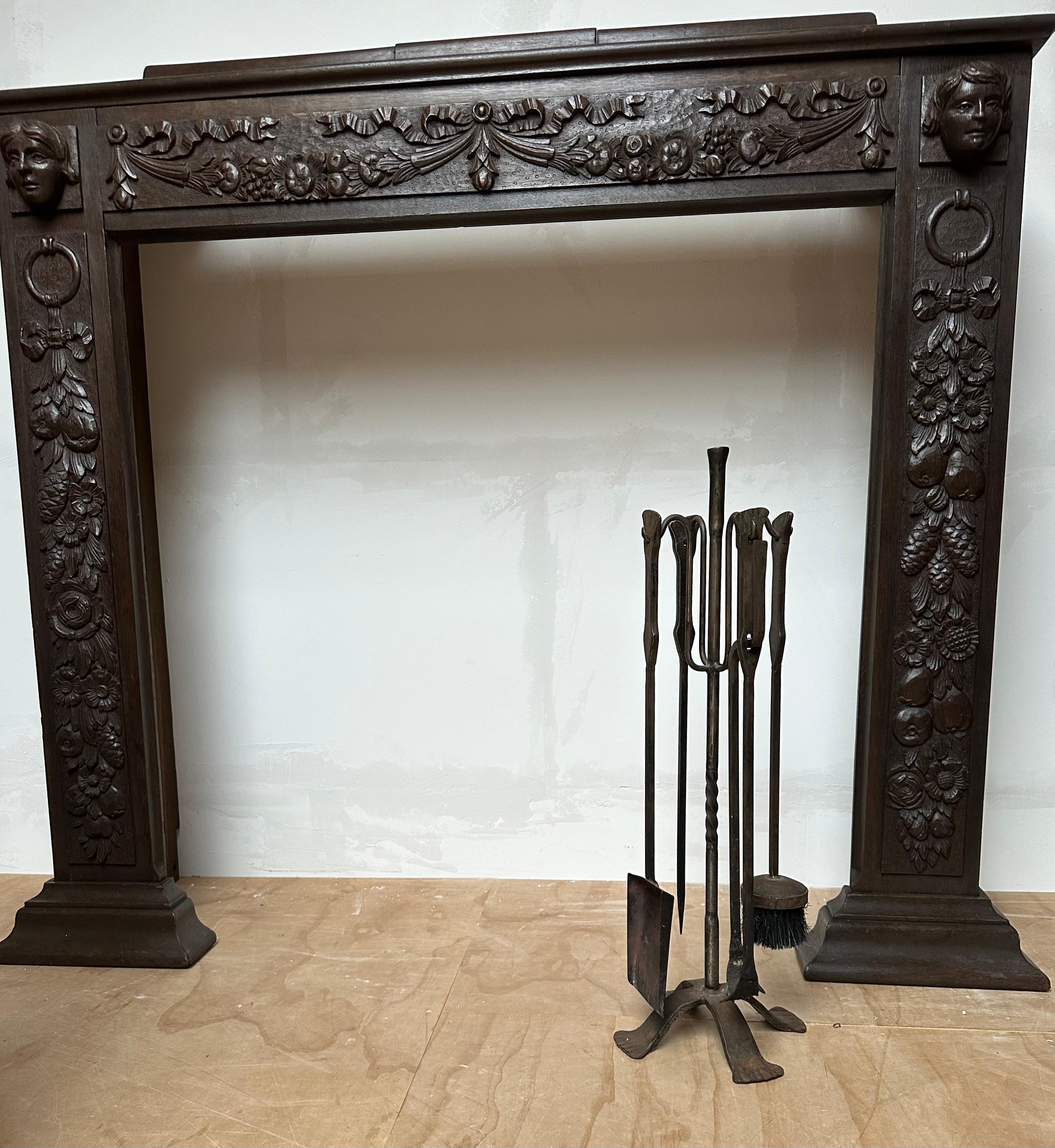 This artistic and strong wrought iron fire set will help manage the fire in your fireplace.

If you are passionate about artistic and handcrafted antiques, then this fireplace set from the Midcentury era could be yours to own and enjoy soon. The