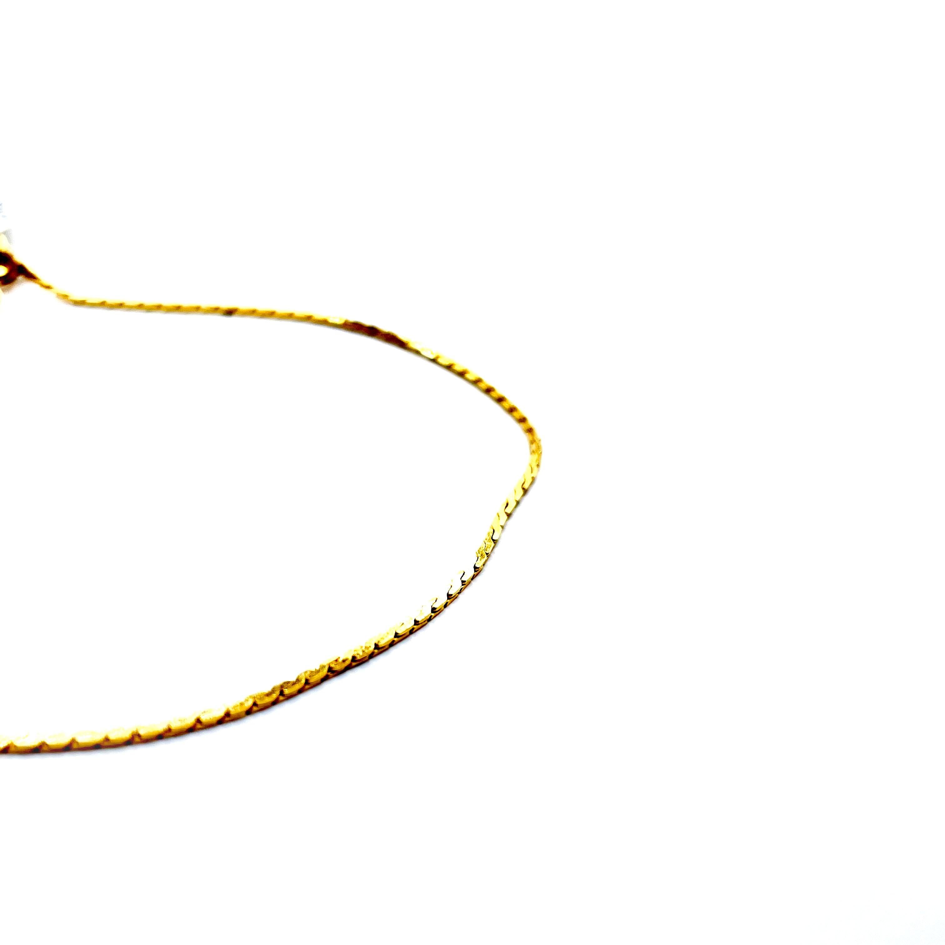 Achieve timeless elegance with this 14K Yellow Gold Chain Bracelet. 
This exquisite bracelet features a classic design with a polished 14K yellow gold chain.

