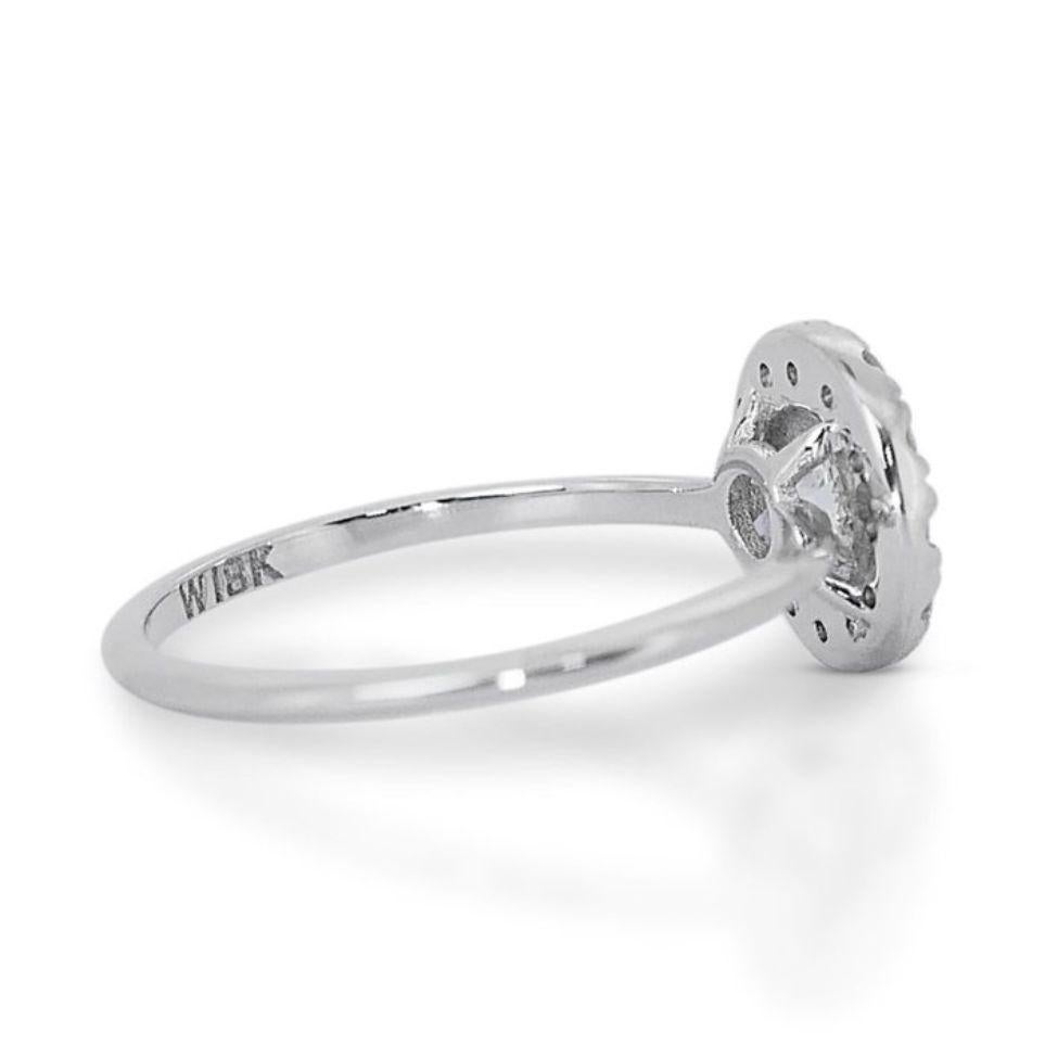Timeless Elegance: Dazzling 0.8ct Round Diamond Ring in 18K White Gold For Sale 2