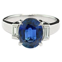 Timeless Elegance: Platinum Trilogy Sapphire & Diamond Ring