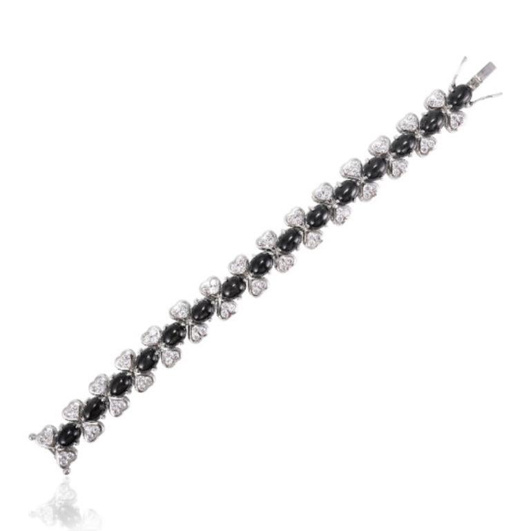 Beautifully handcrafted Black Star and Diamond Tennis Bracelets, designed with love, including handpicked luxury gemstones for each designer piece. Grab the spotlight with this exquisitely crafted piece. Inlaid with natural black star gemstones,