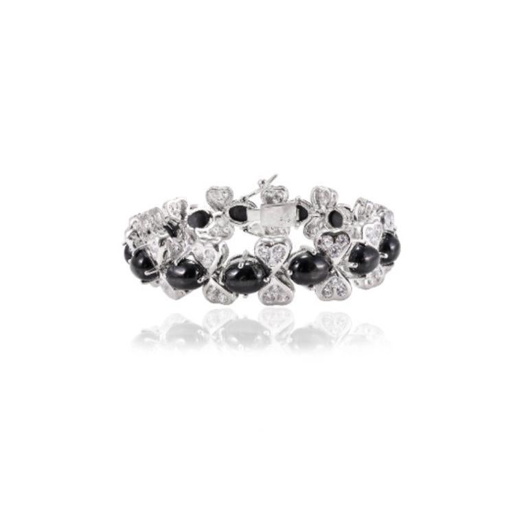 Oval Cut Timeless Elegance Sterling Silver Bracelet with 39.5 CTW Black Star and Diamond For Sale
