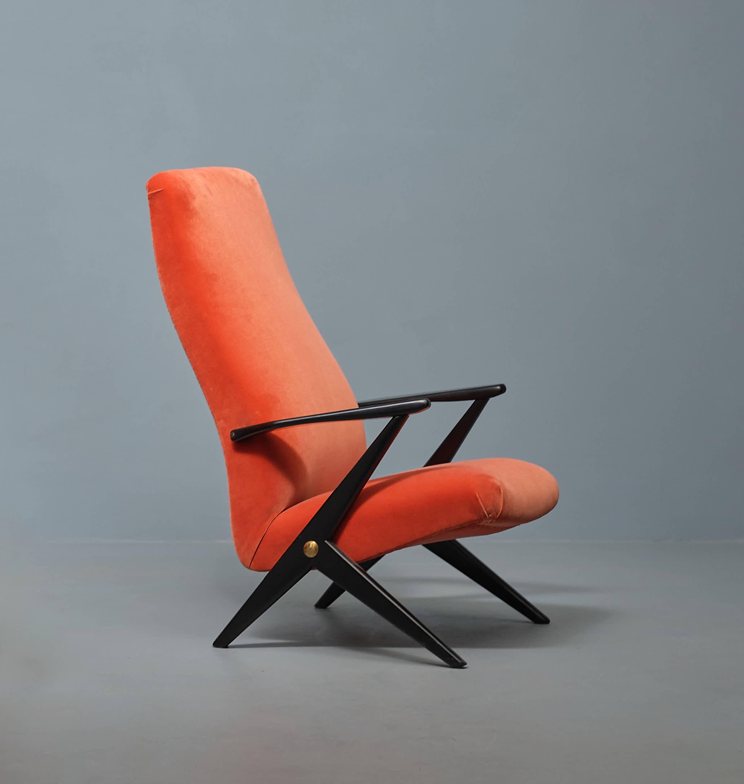 Discover timeless elegance with this exquisite Swedish lounge chair designed by Bengt Ruda, renowned for his iconic Triva model. Featuring a distinctive high backrest, this chair is a perfect blend of midcentury charm and vintage allure. The black