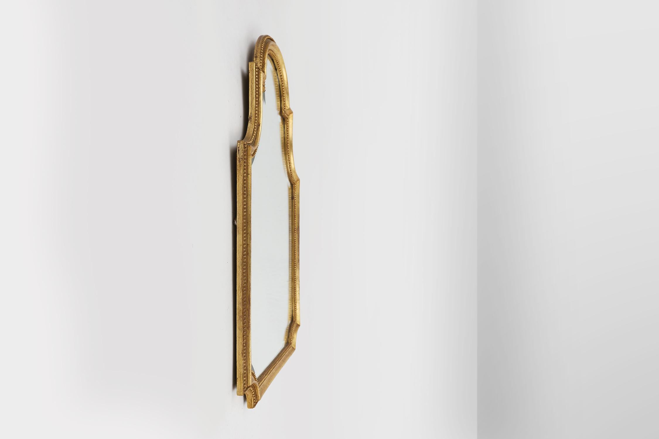 Mirror Timeless elegant wall mirror in gilted wood, France 1950s