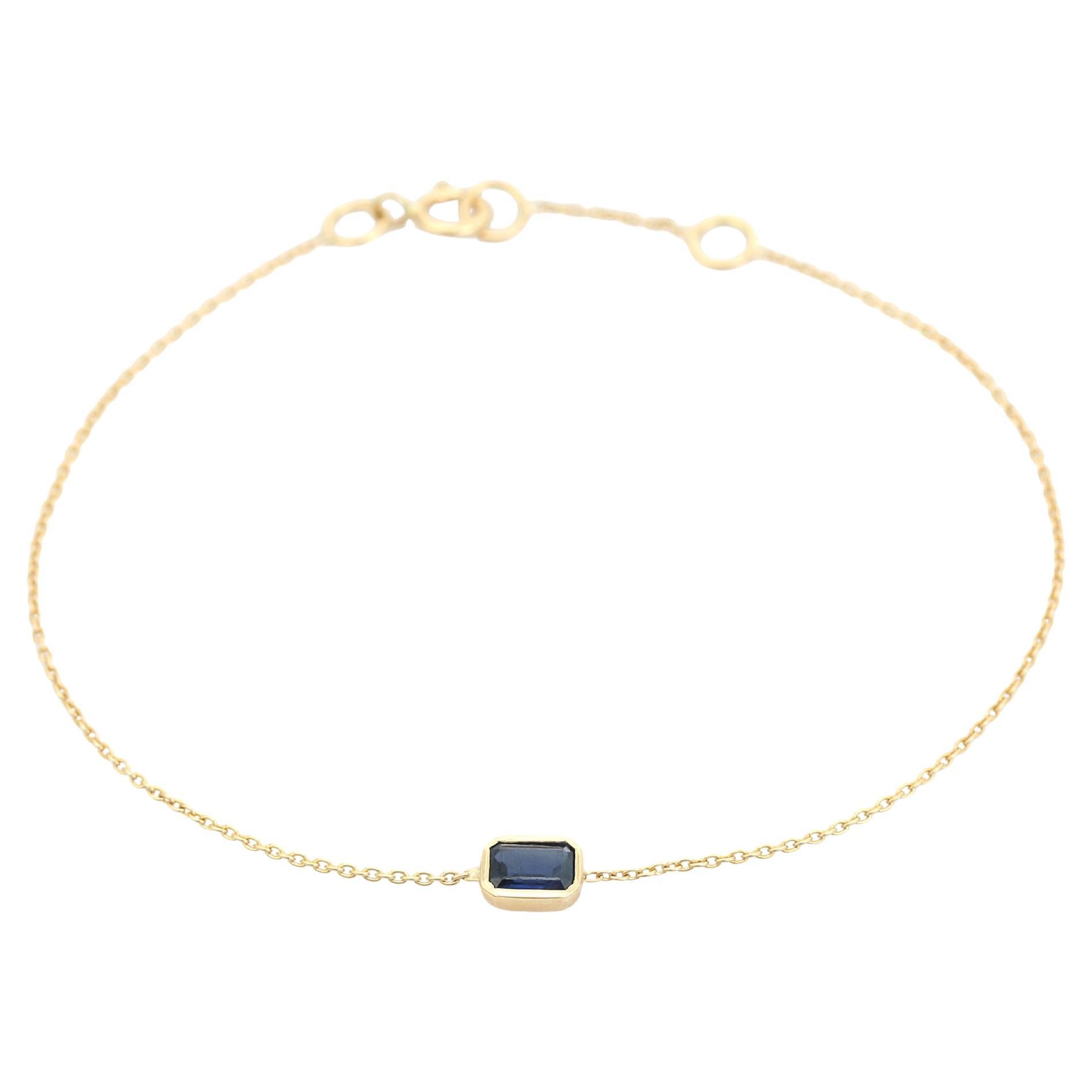 Atemporal Pulsera de cadena de zafiro azul talla esmeralda en joyería de oro amarillo de 14 quilates en venta
