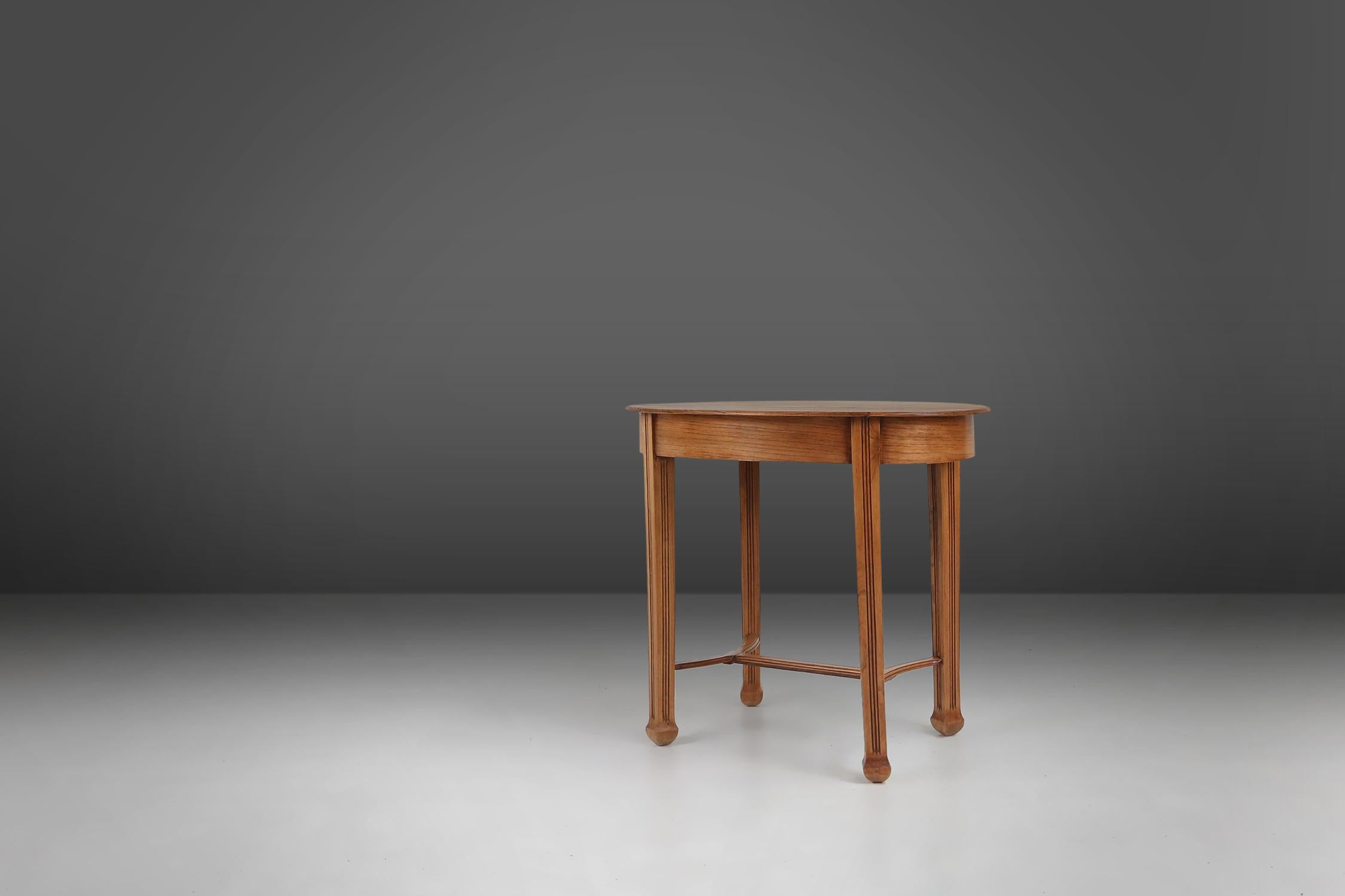 Carved Timeless French Art Deco side table in oak, 1930s  For Sale