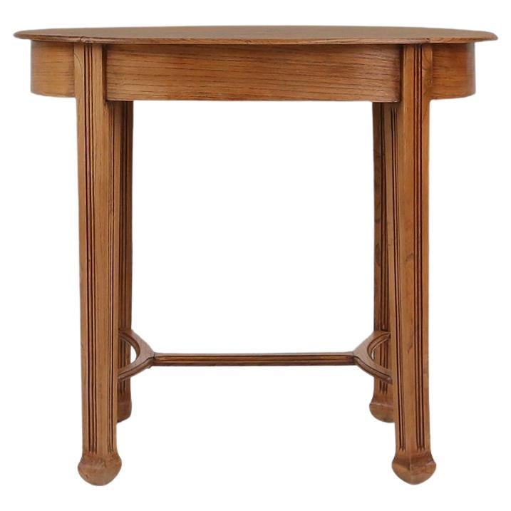Timeless French Art Deco side table in oak, 1930s  For Sale