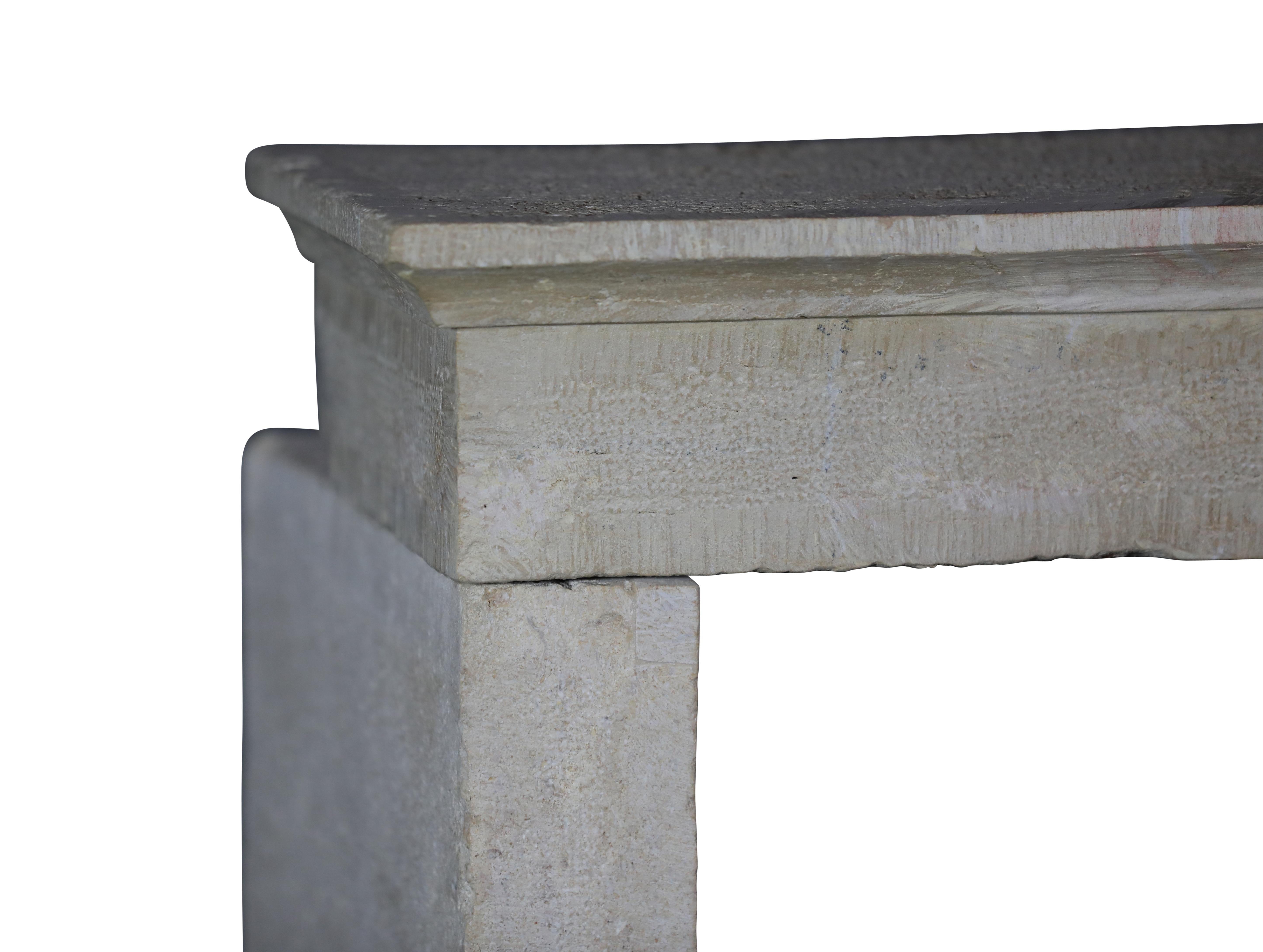 Hand-Carved Timeless French Beige Reclaimed Limestone Fireplace Surround For Sale