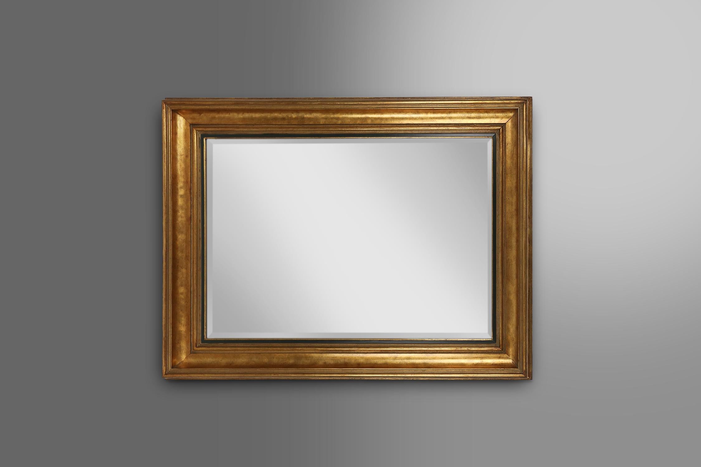 Belgium / 1960 / mirror / Deknudt / wood / mid-century / design / vintage

An elegant designed rectangular shaped mirror by Deknudt in Belgium, around 1960. Crafted in wood and beautifully gilded with an elegant black inner frame. The mirror can be