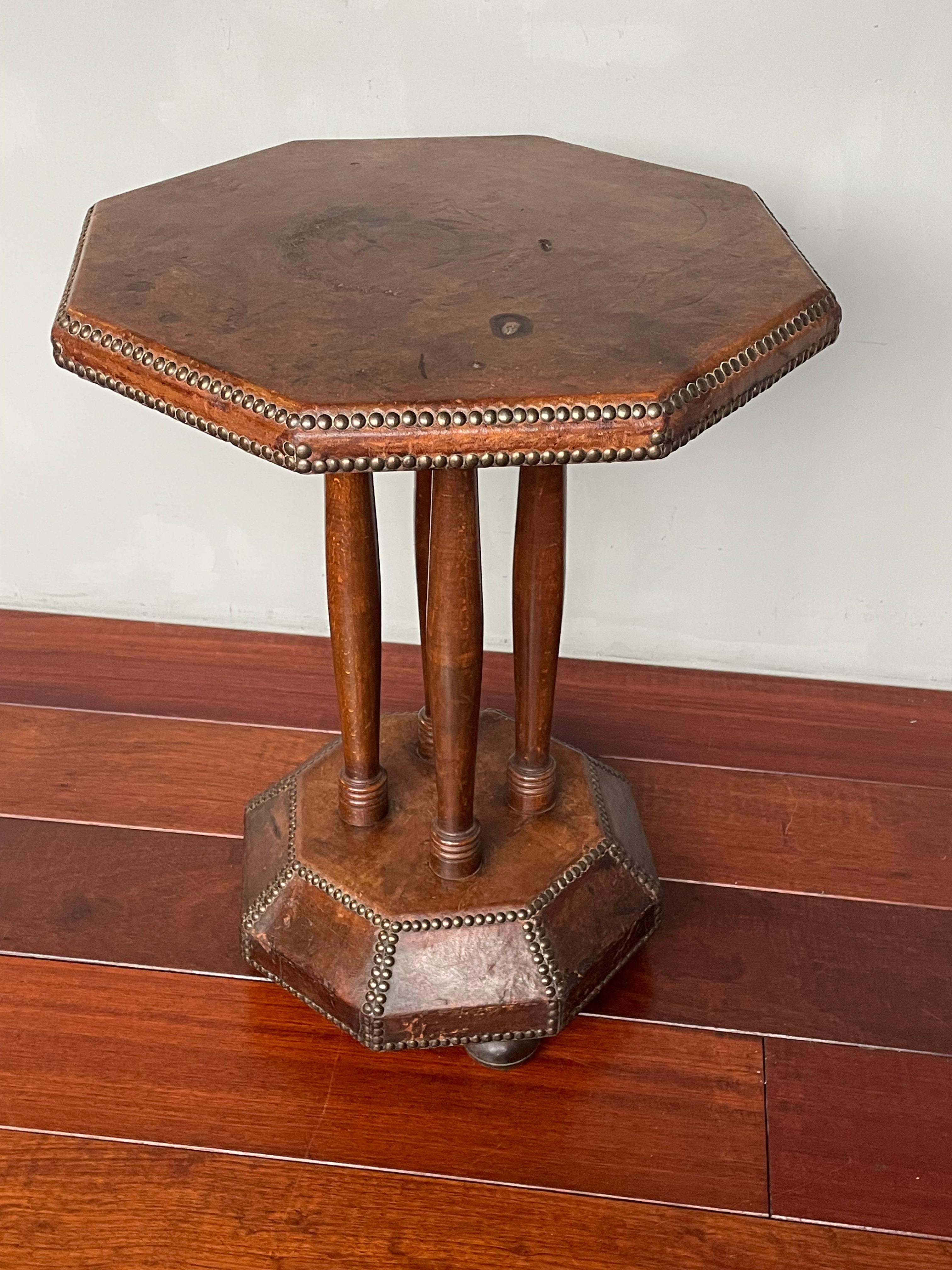 Wonderful, sheepskin leather Art Deco table.

This handcrafted wood, leather and brass table is of a timeless design and it will look great in all kinds of interiors. The aging of all three materials combined has given this wonderful and rare table