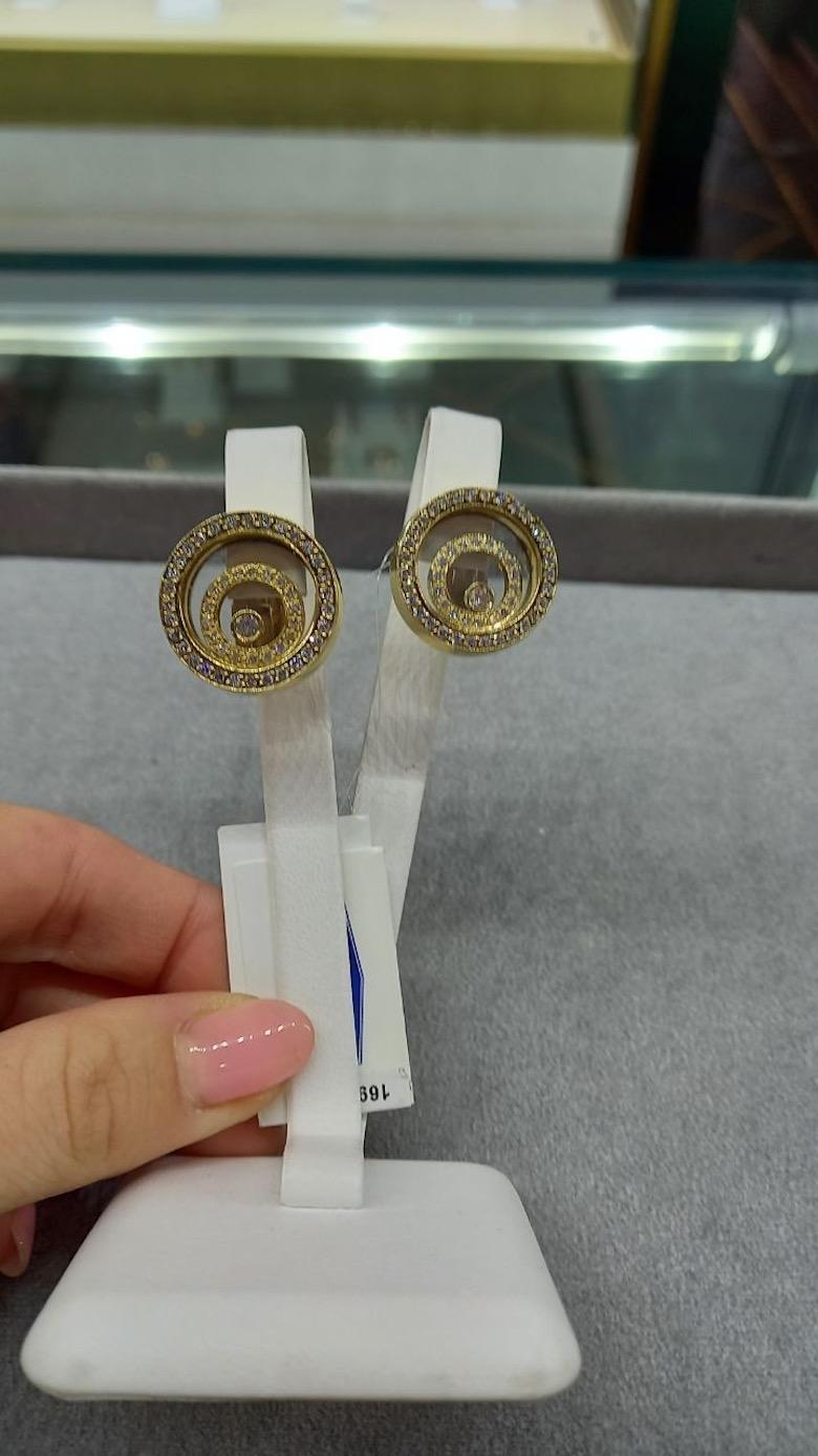 Earrings Yellow Gold 18 K (Available Matching Ring)

Diamond 2 RND - 0,16 ct 3/5A
Diamond 98 RND - 1,07 ct 4/6A
Weight 21.29 grams

With a heritage of ancient fine Swiss jewelry traditions, NATKINA is a Geneva based jewellery brand, which creates