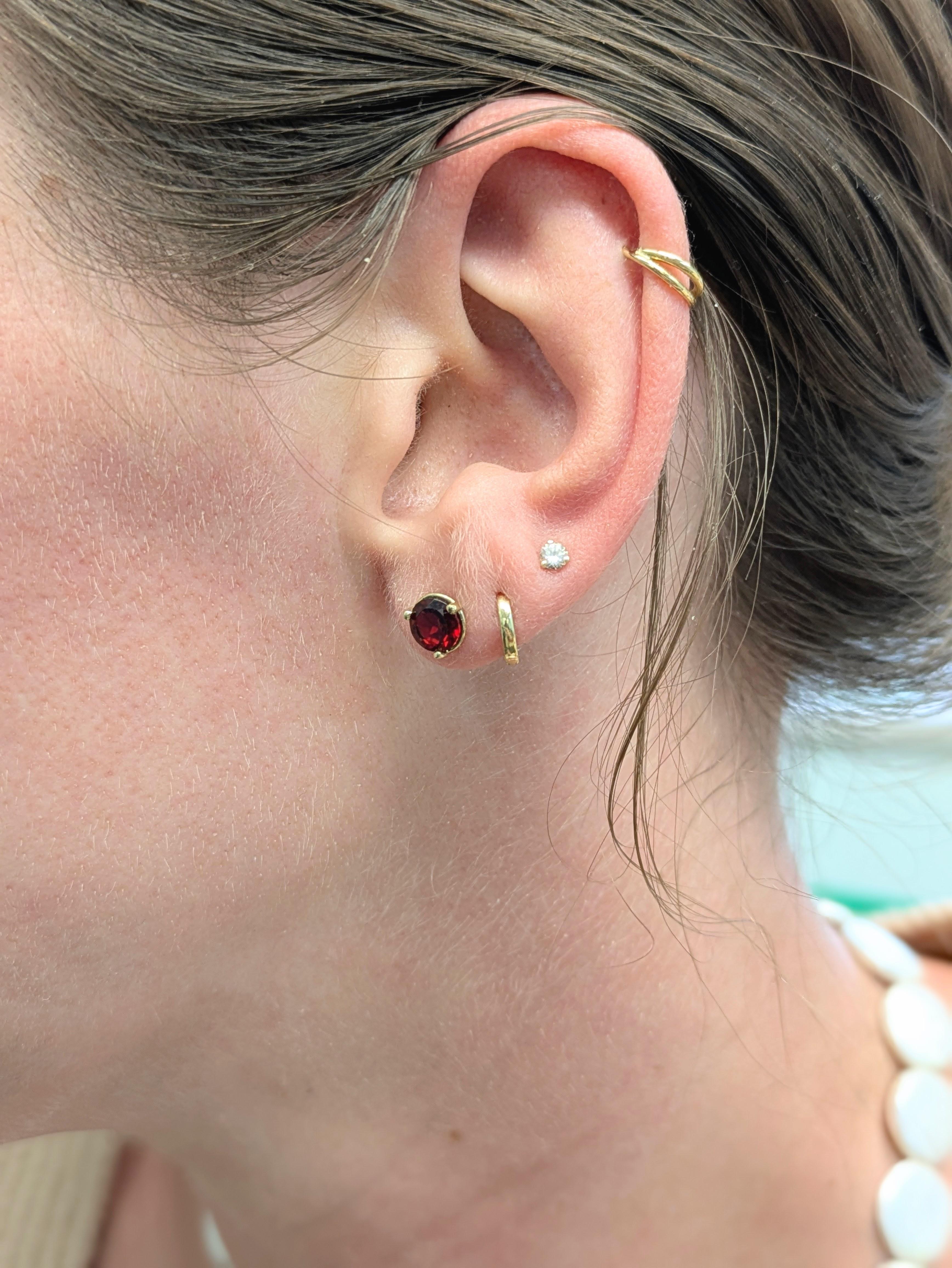 There’s beauty in simplicity—and these 6mm Red Garnet studs prove it. With a refined 3-prong martini setting and the rich tone of solid 14k gold, these earrings blend understated luxury with everyday versatility. Whether it’s a birthday,
