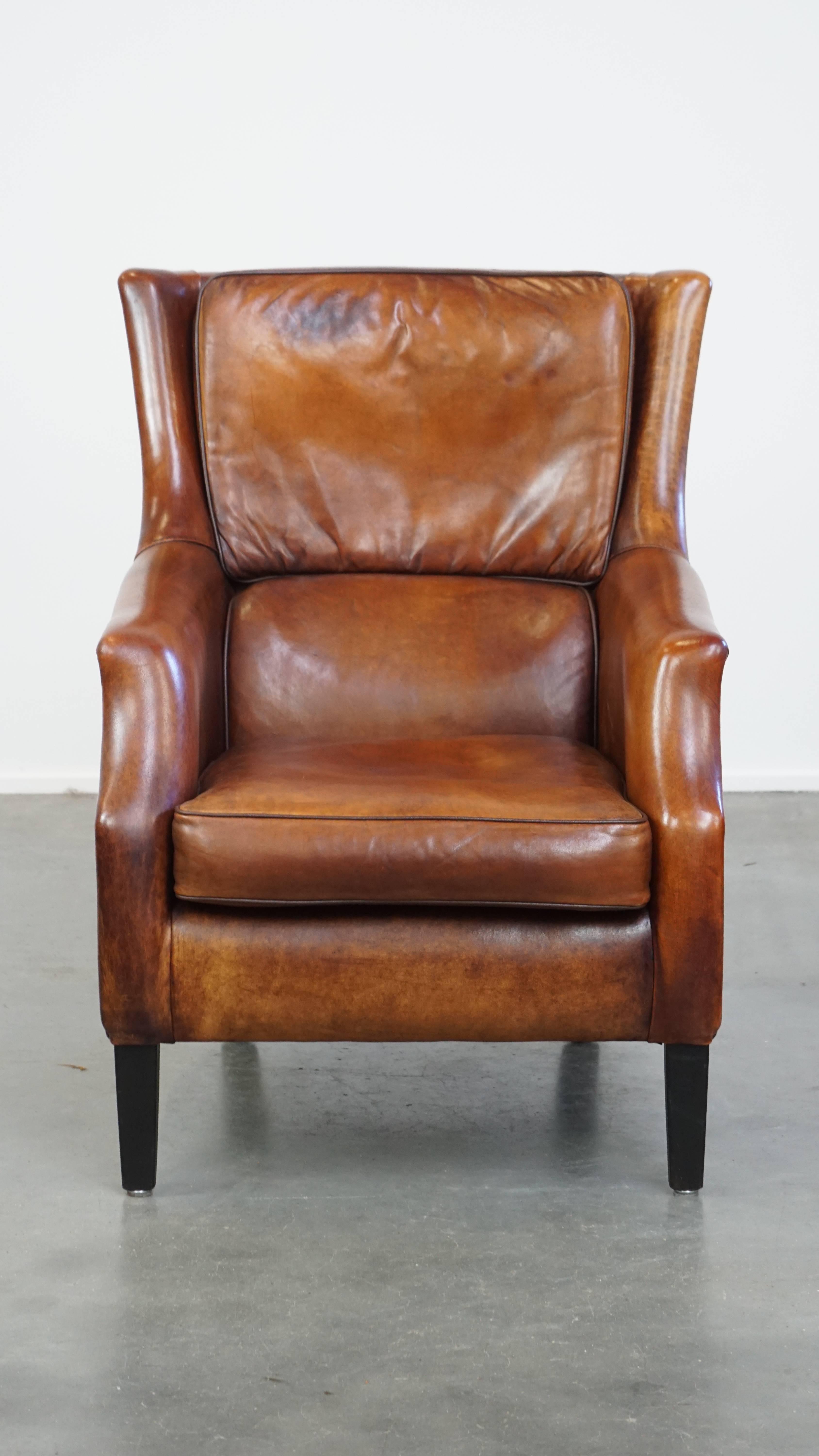 This wonderful sheepskin leather armchair is the perfect place to unwind after a long day. Who could possibly resist it? We certainly can't!

With its beautiful warm tones and clean, straight lines, this armchair exudes both elegance and