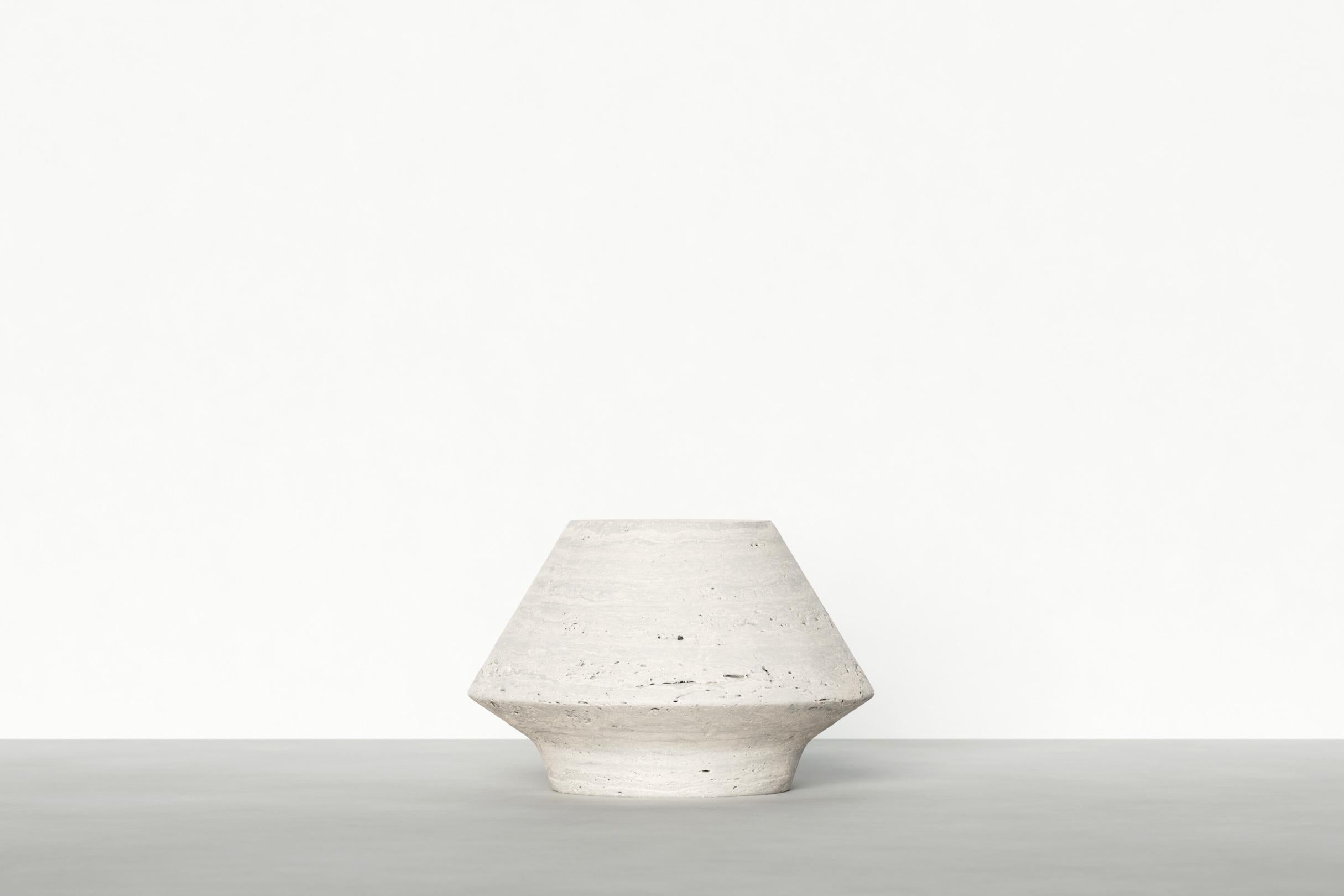 Timeless side table I by Maria Osminina
Limited Edition of 12
Dimensions: 37 ? 37 ? 24 cm
Materials: Travertino Romano

Timeless is a series of pieces of stone furniture in which the aesthetic vector is aimed at a deep sense of time as being.