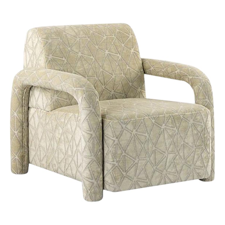 Poltrona senza tempo realizzata a mano con braccioli tubolari in lussuoso velluto jacquard