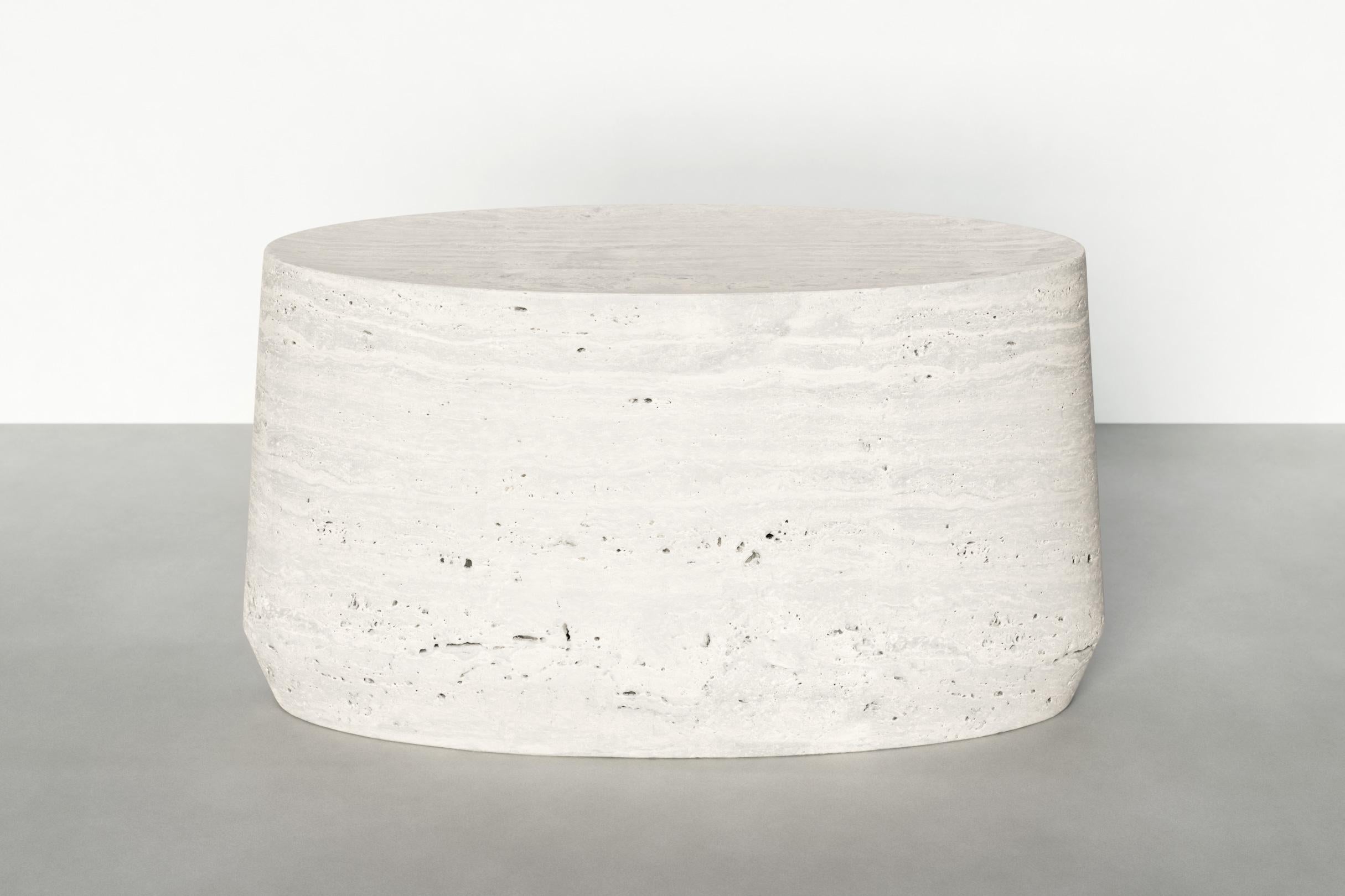 Timeless table V by Maria Osminina
Limited Edition of 12
Dimensions: 81 x 38 x 44 cm
Materials: Travertino Romano

Timeless is a series of pieces of stone furniture in which the aesthetic vector is aimed at a deep sense of time as being. It is in