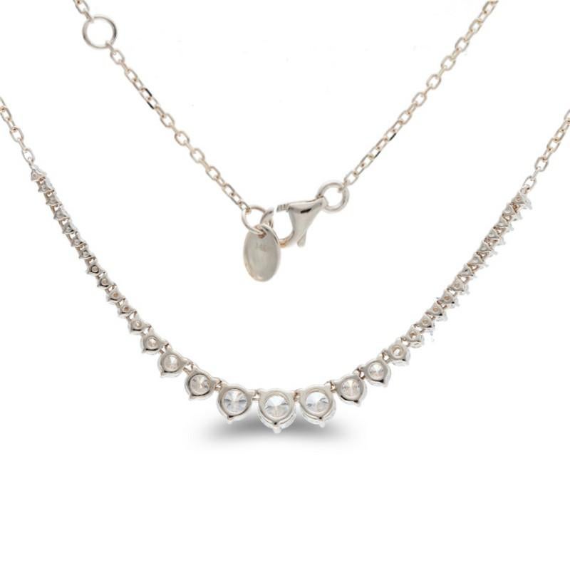 Diamonds: 33 meticulously selected round diamonds grace this necklace, each securely set in a classic prong setting. The total carat weight of 1.55 carats ensures a captivating and enduring sparkle.

Gold Setting: Crafted with precision in luxurious