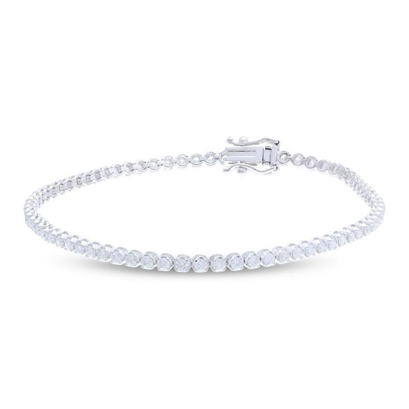 Diamond Total Carat Weight: This exquisite Timeless Tennis bracelet showcases a total carat weight of 1.7 carats, featuring 73 brilliant round diamonds that create a stunning and timeless piece of jewelry.

Round Diamonds: Seventy-three meticulously