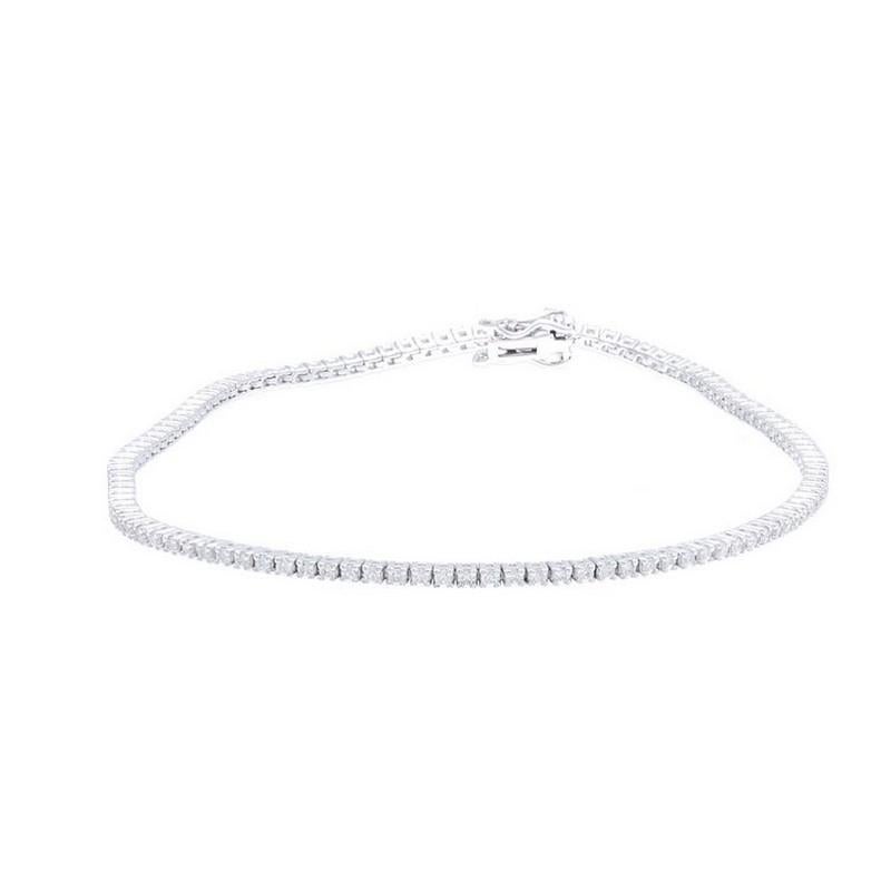 Round Cut Timeless Tennis Bracelet in 18K White Gold and Diamonds (0.86ct) For Sale