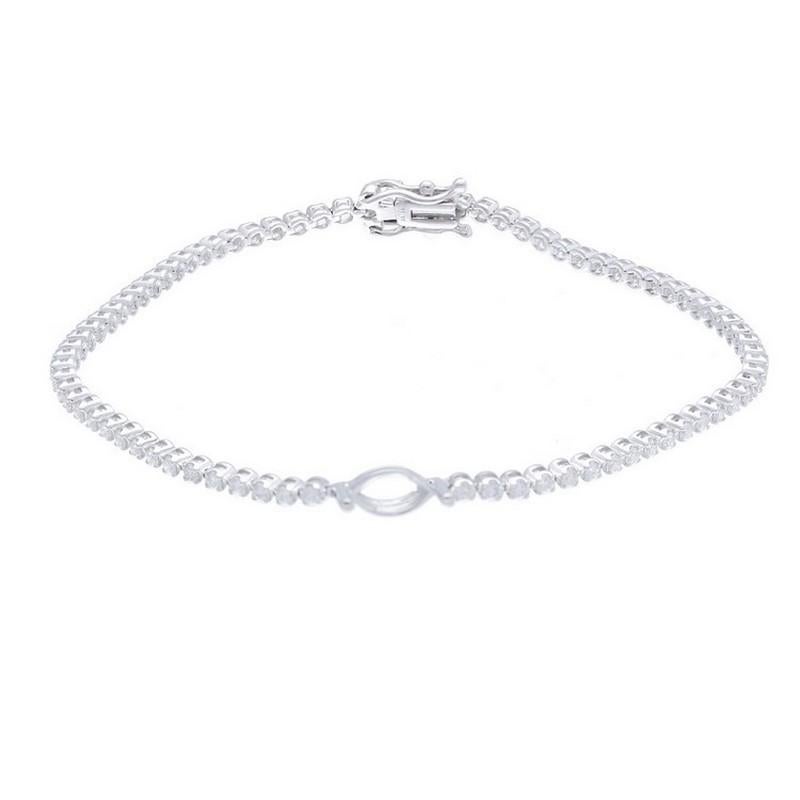 Diamond Total Carat Weight: This exquisite Timeless Tennis bracelet showcases a total carat weight of 1.1 carats, featuring 77 brilliant round diamonds that create a stunning and timeless piece of jewelry.

Gold Setting: Crafted with precision in