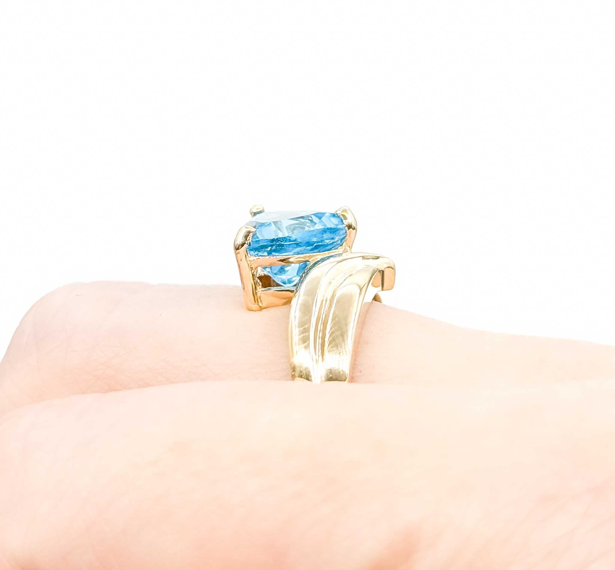 Trillion Cut Timeless Topaz Elegance Ring in 10k Bypass Gold For Sale