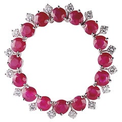 Timeless Treasure:18kt White Gold Brooch with 12 ct Burmese Rubies and Diamonds