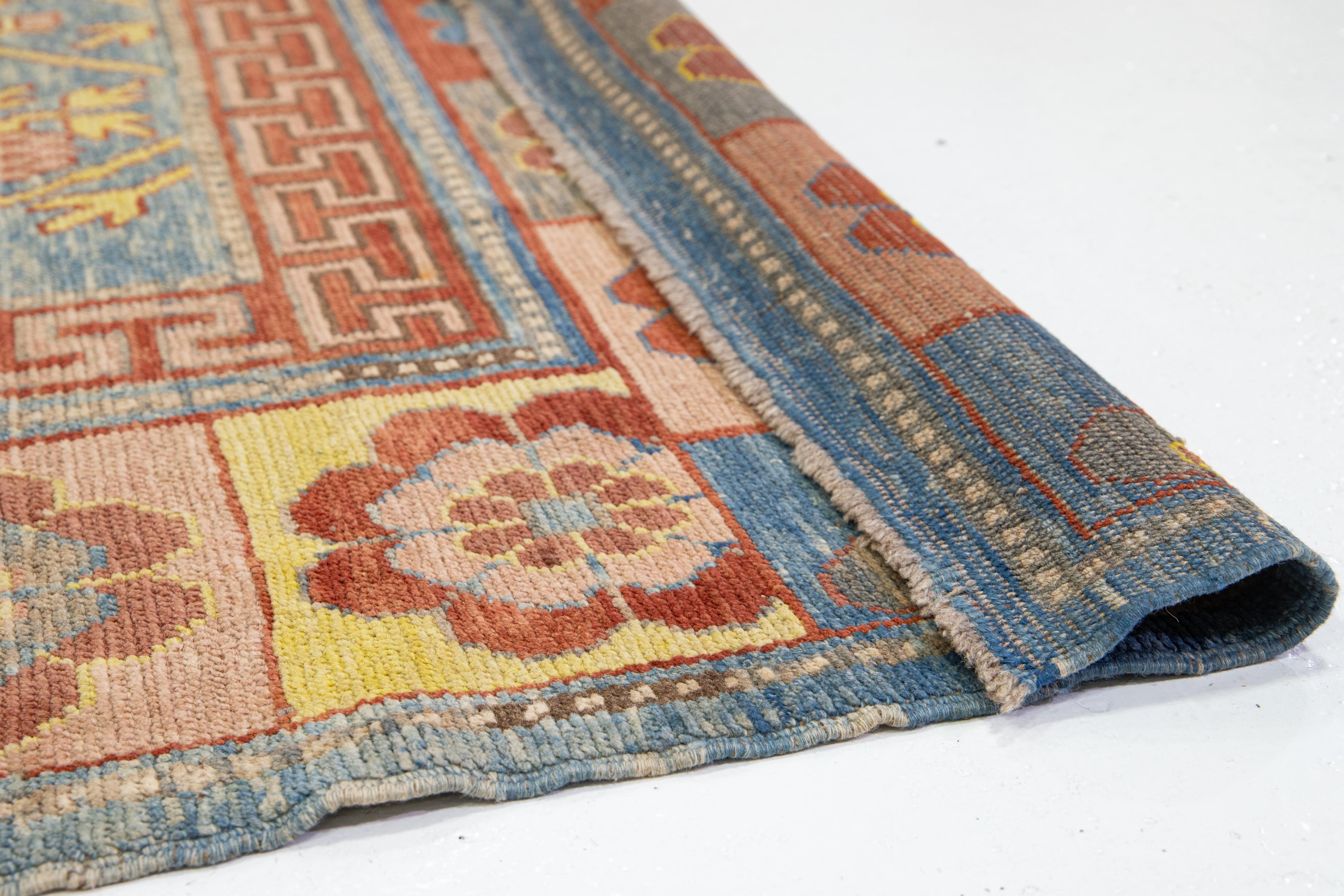 Afghan Timeless Vintage Khotan Style Blue Wool Rug Featuring an Allover Design For Sale