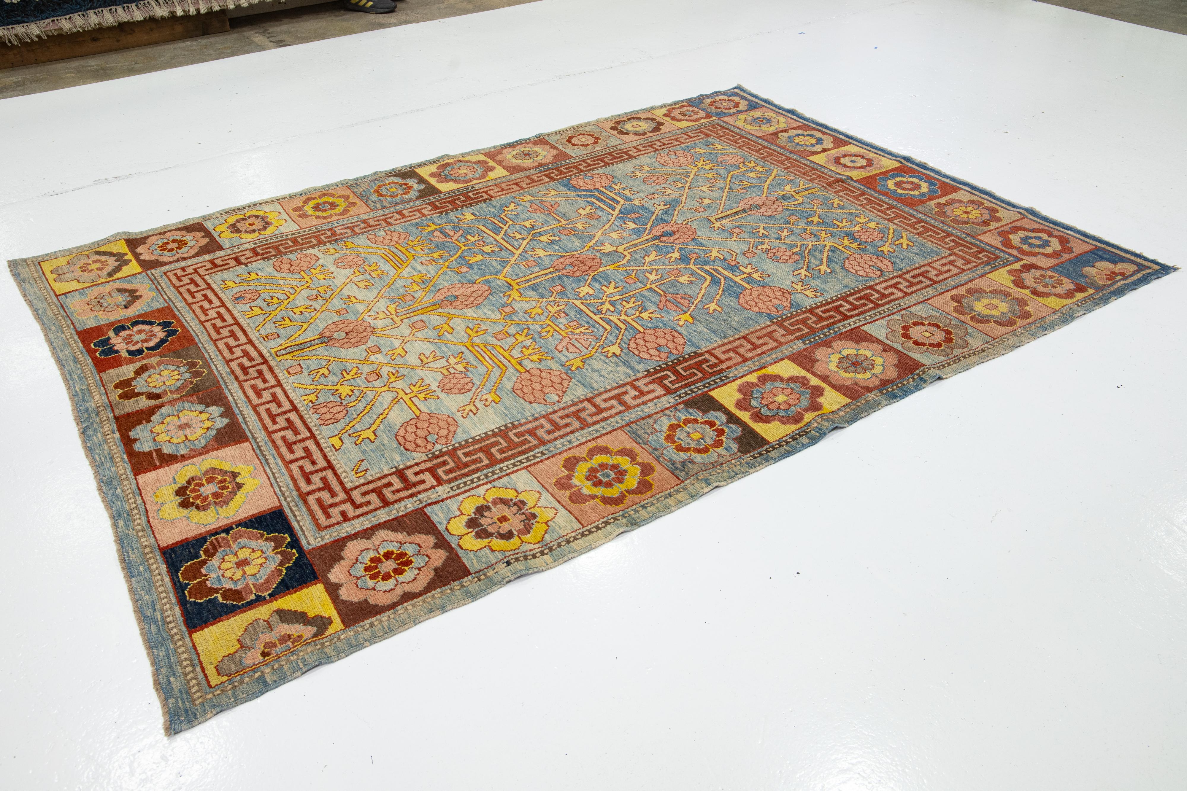 Timeless Vintage Khotan Style Blue Wool Rug Featuring an Allover Design In Excellent Condition For Sale In Norwalk, CT