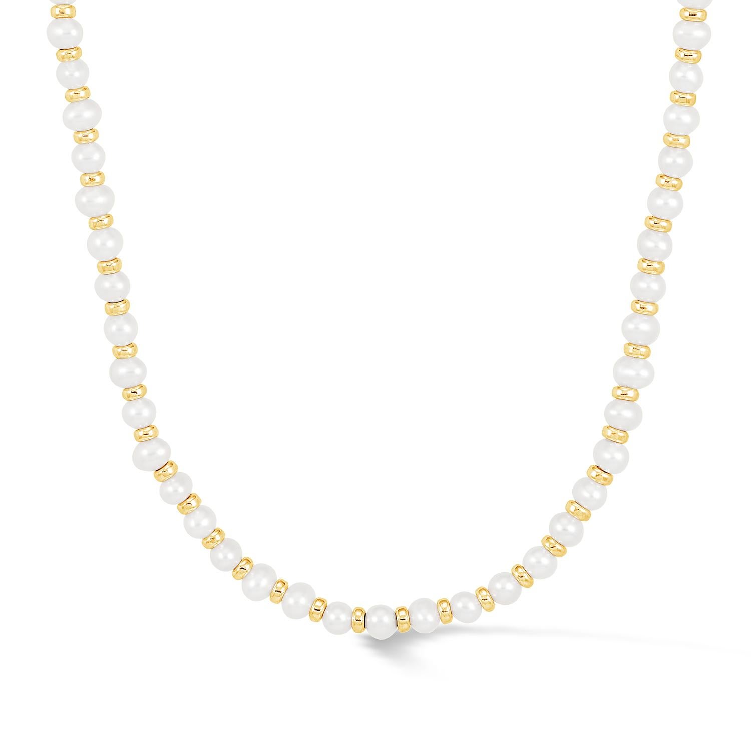 Thread by hand in our London studio, this pearl necklace will slip seamlessly into your collection of style staples. The modern mix of lustrous white freshwater pearls and radiant gold vermeil beads makes it perfect for layering with other necklaces