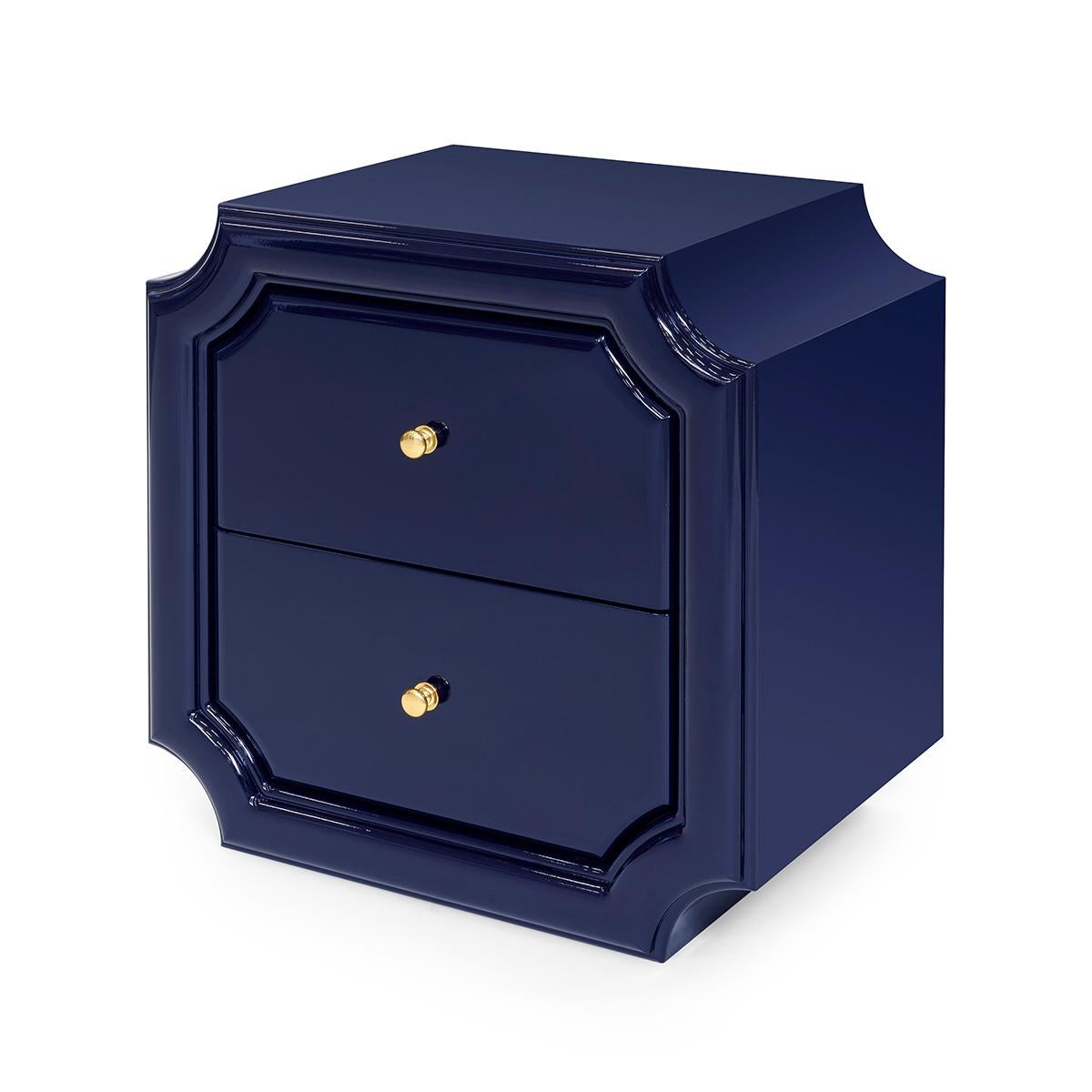 Side table Timeo blue in solid wood
in blue lacquered finish. With 2 drawers
with easy glide system on metal runners,
with brass button handles.