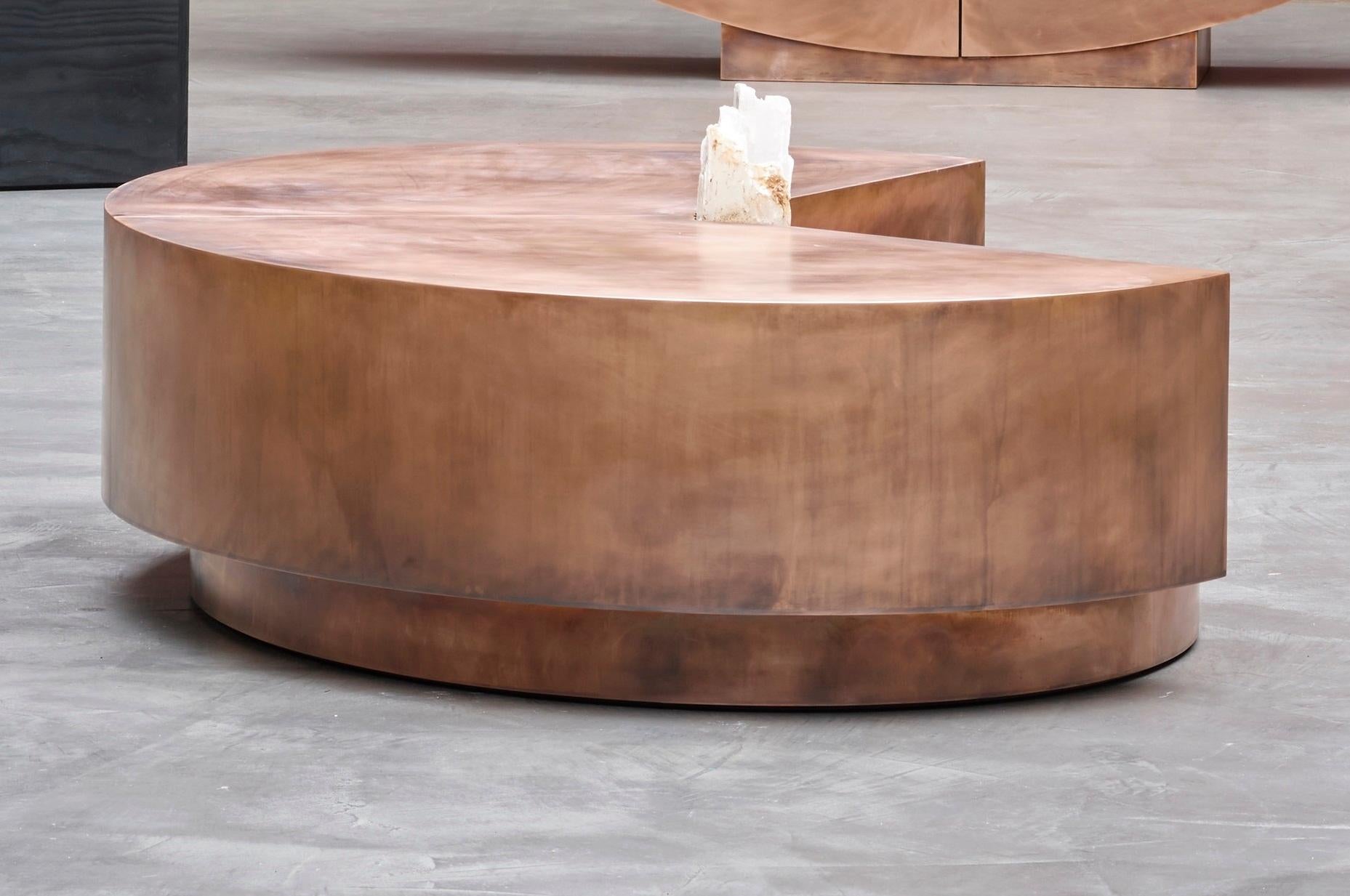 Timetable With Rough Crystal Stone by Pierre De Valck
Unique Piece.
Dimensions: W 100 x D 150 x H 35 cm.
Materials: Patinated bronze and Rough Crystal stone.

Pierre de Valck, Rick Owens, Pierre Jeanneret, and Niclas Wolff, four artists whose works