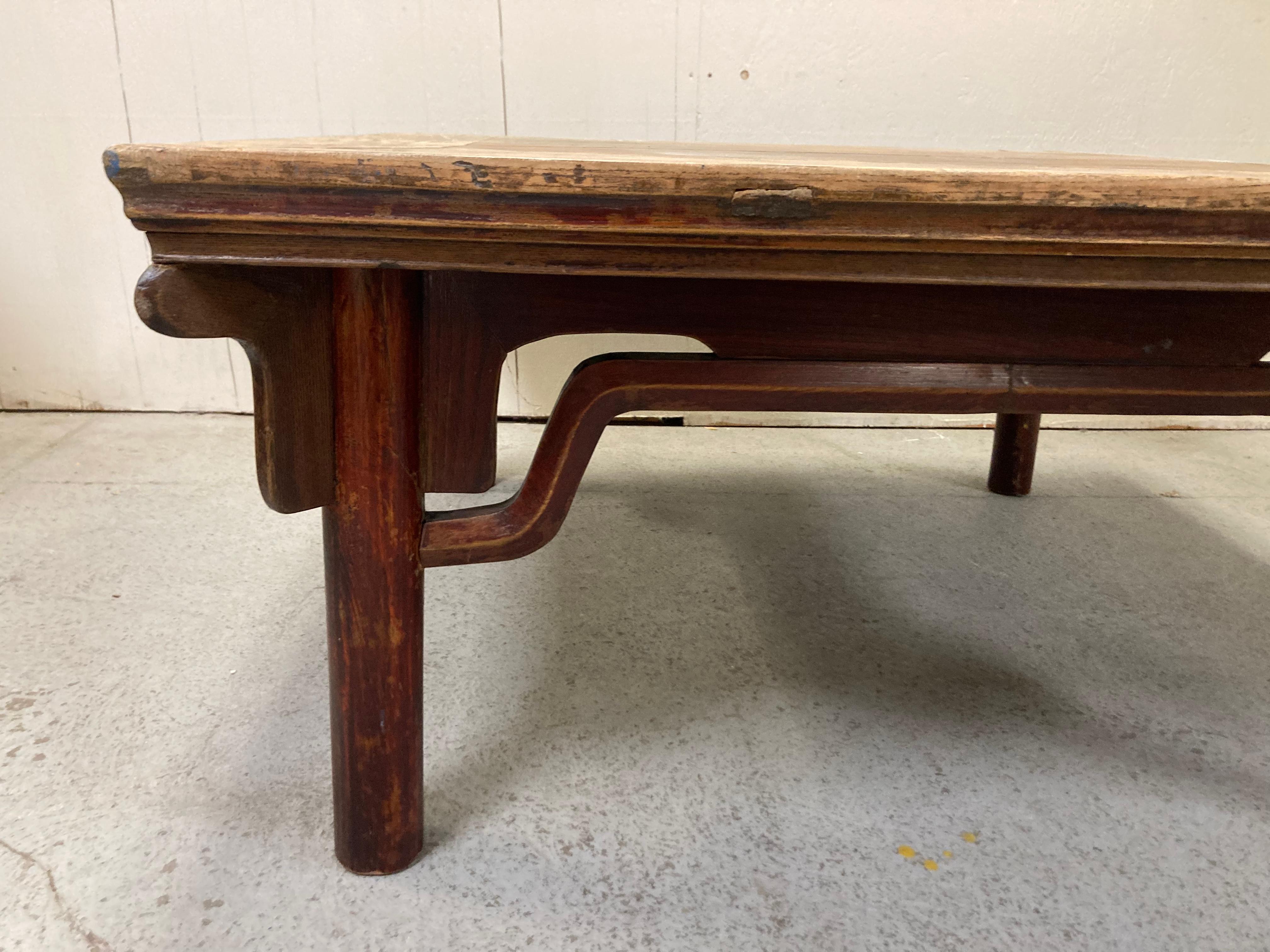 Antique Chineses Eight Immortals Table likely from the Northern Shandong region. Originally used with four benches, each holding two people. The table was probably cut down from dining to Cocktail Table height to appeal to a Western market. With a