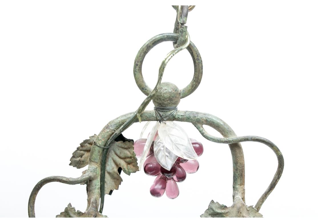 Painted Timeworn Tole Chandelier With Glass Grape Clusters And Figural Panel For Sale