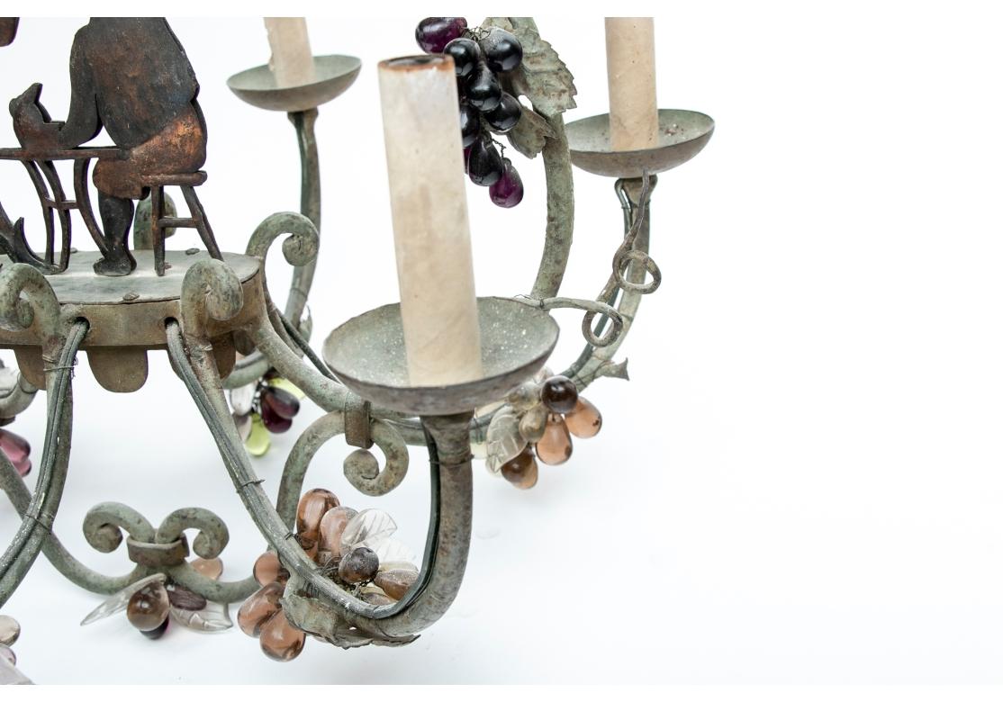 20th Century Timeworn Tole Chandelier With Glass Grape Clusters And Figural Panel For Sale